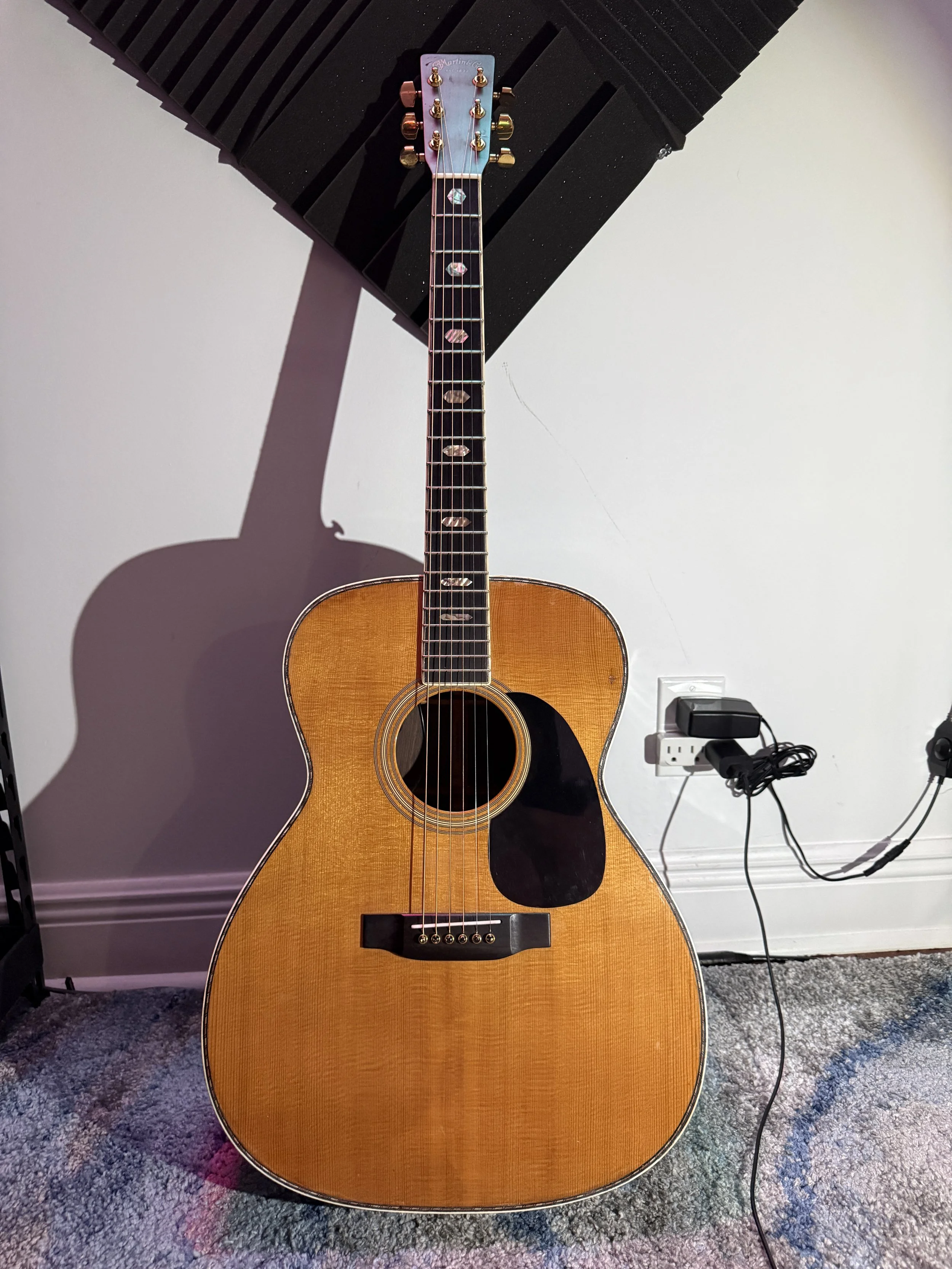 Name: Lucky |
Model: Martin J-40 1980s? |
Finish: Natural |
Background: Traded for a Gibson J-45 Studio I never photographed, this guitar spent years abandoned in a cabin, subjected to harsh elements and brought to within an inch of its life. In the 