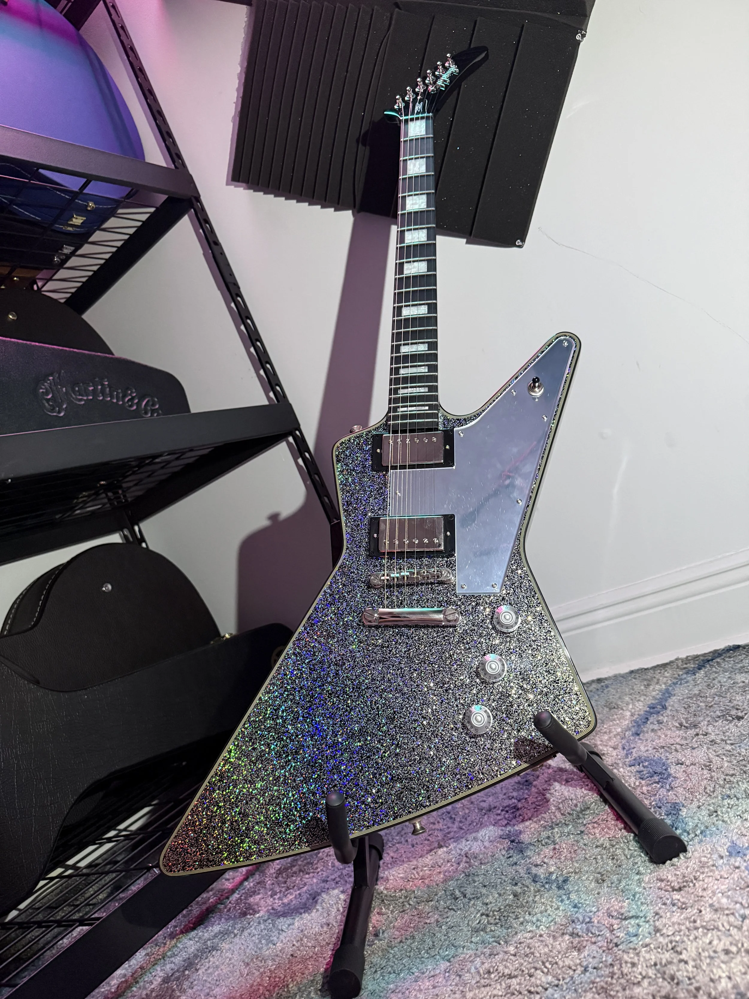 Name: Mia |
Model: Epiphone Lzzy Hale Explorer 2026 |
Finish: Holographic Black |
Background: In need of a Miami-as-fuck guitar for Miami Art Week 2026, I bought this days before Gibson Garage opened, dropping a literal Miami Vice line. Oh well, this