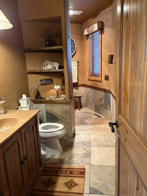 Main Floor Full Bathroom adjacent to fourth bedroom