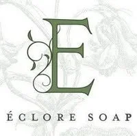 Logo for Eclore Soap. It is a fancy E with a vine growing out the back of it.
