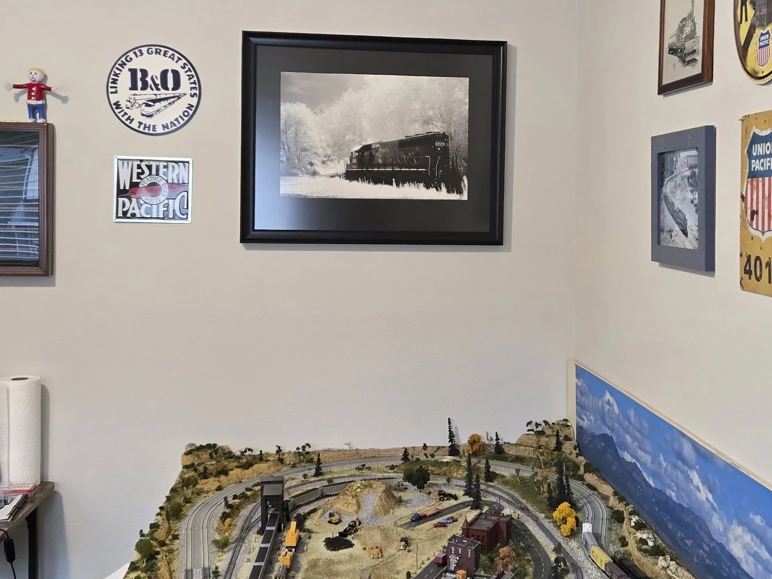 Burt's infrared custom framed piece over his awesome train set.