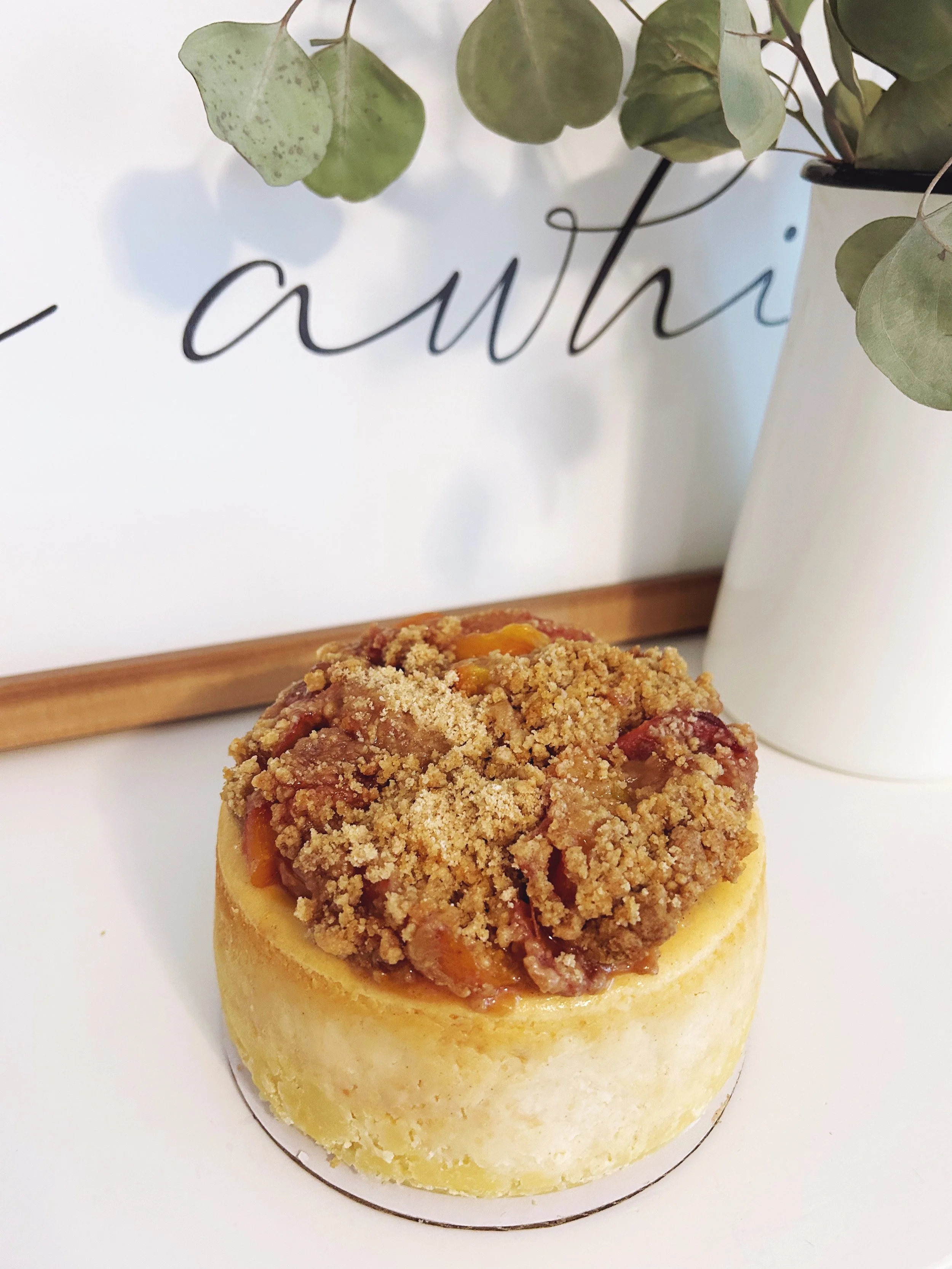 Cinnamon Peach Crisp Cheesecake