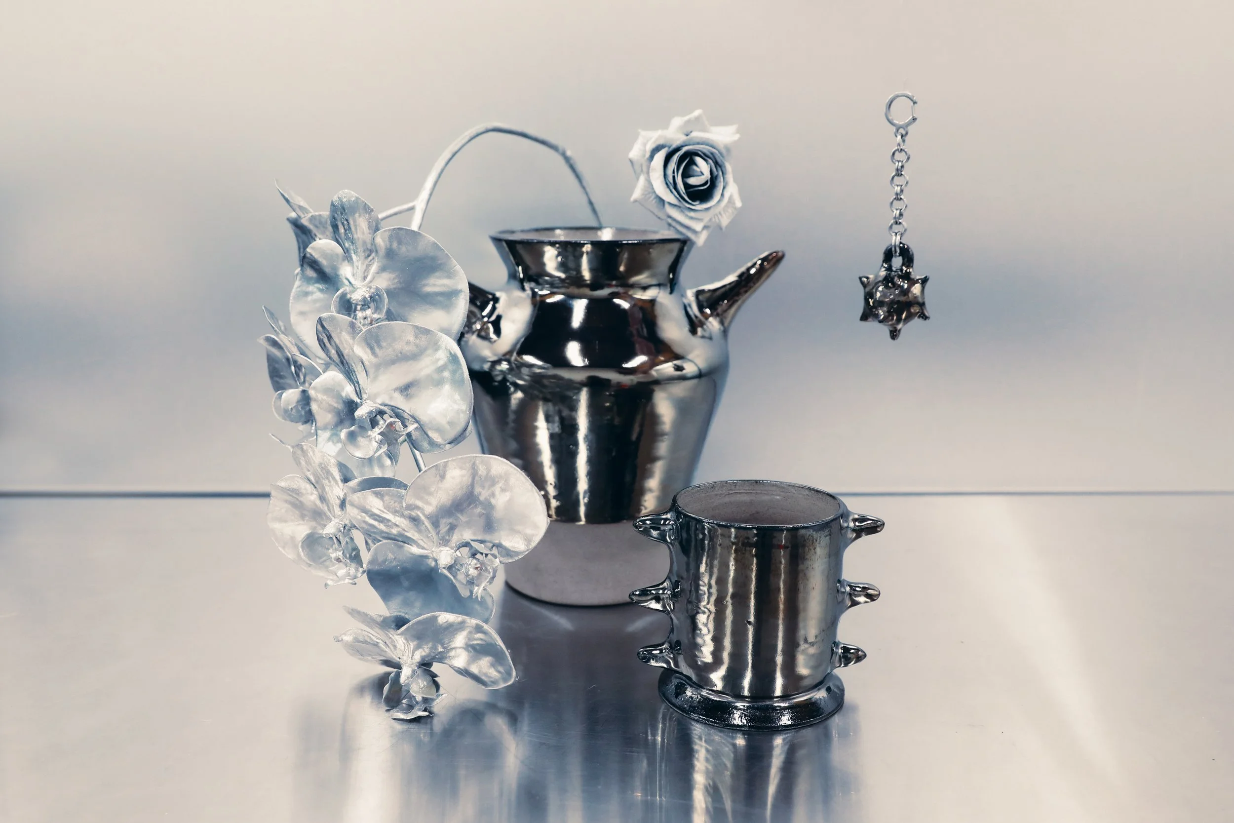 spike-vase-cup-charm-silver.jpg