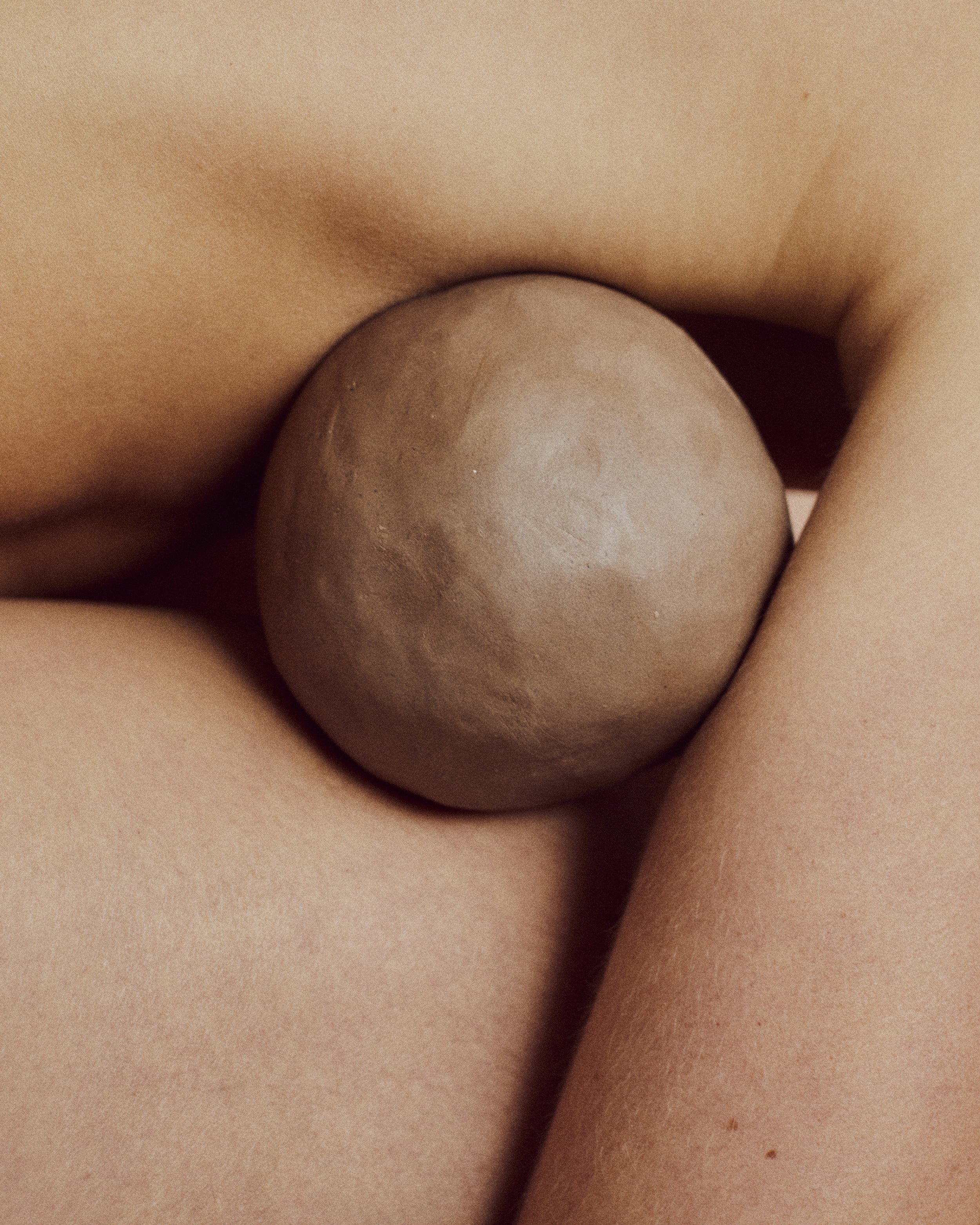 Close-up of a person's body, showing skin and skin folds.