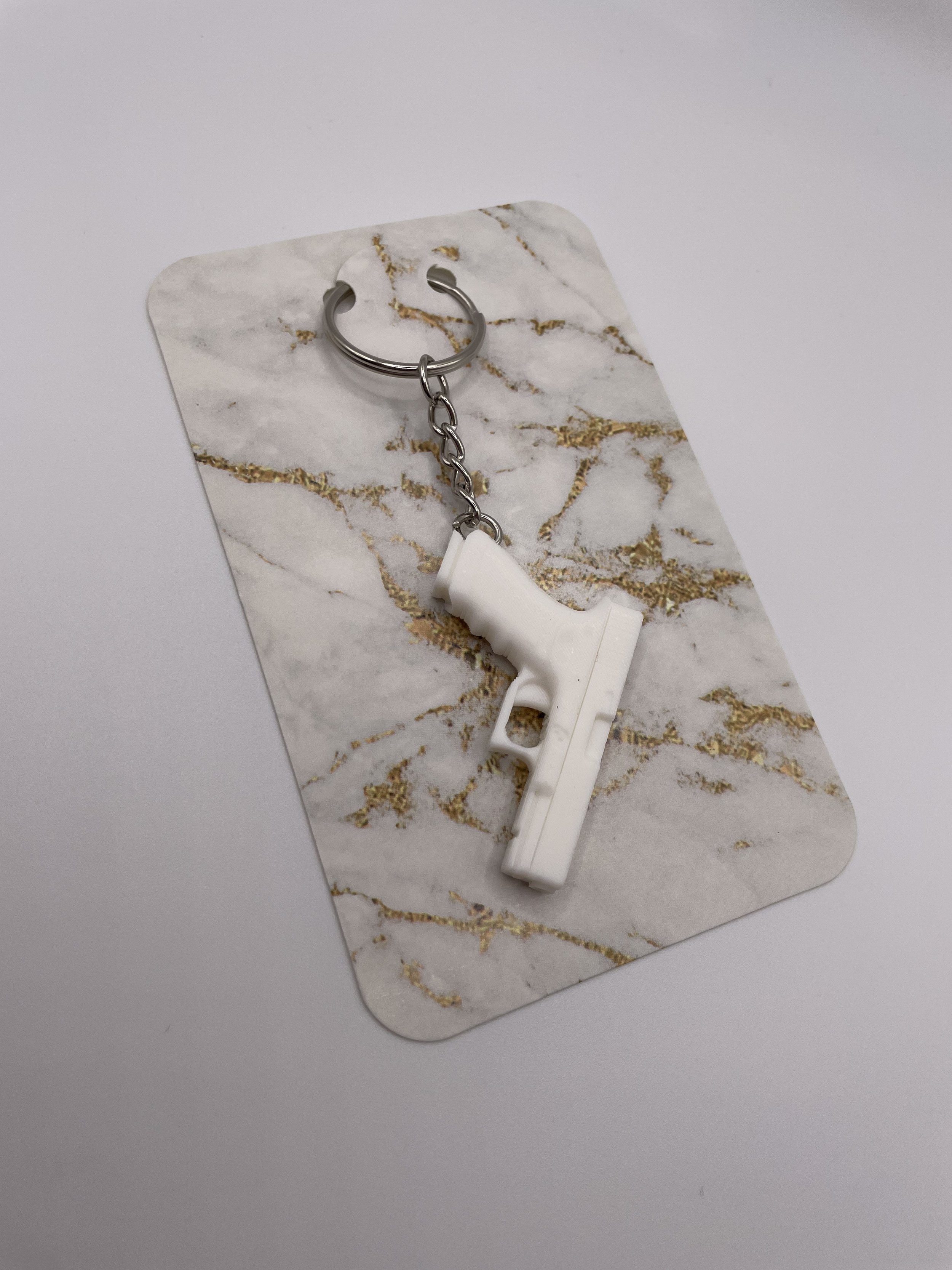 white glock keychain.jpeg