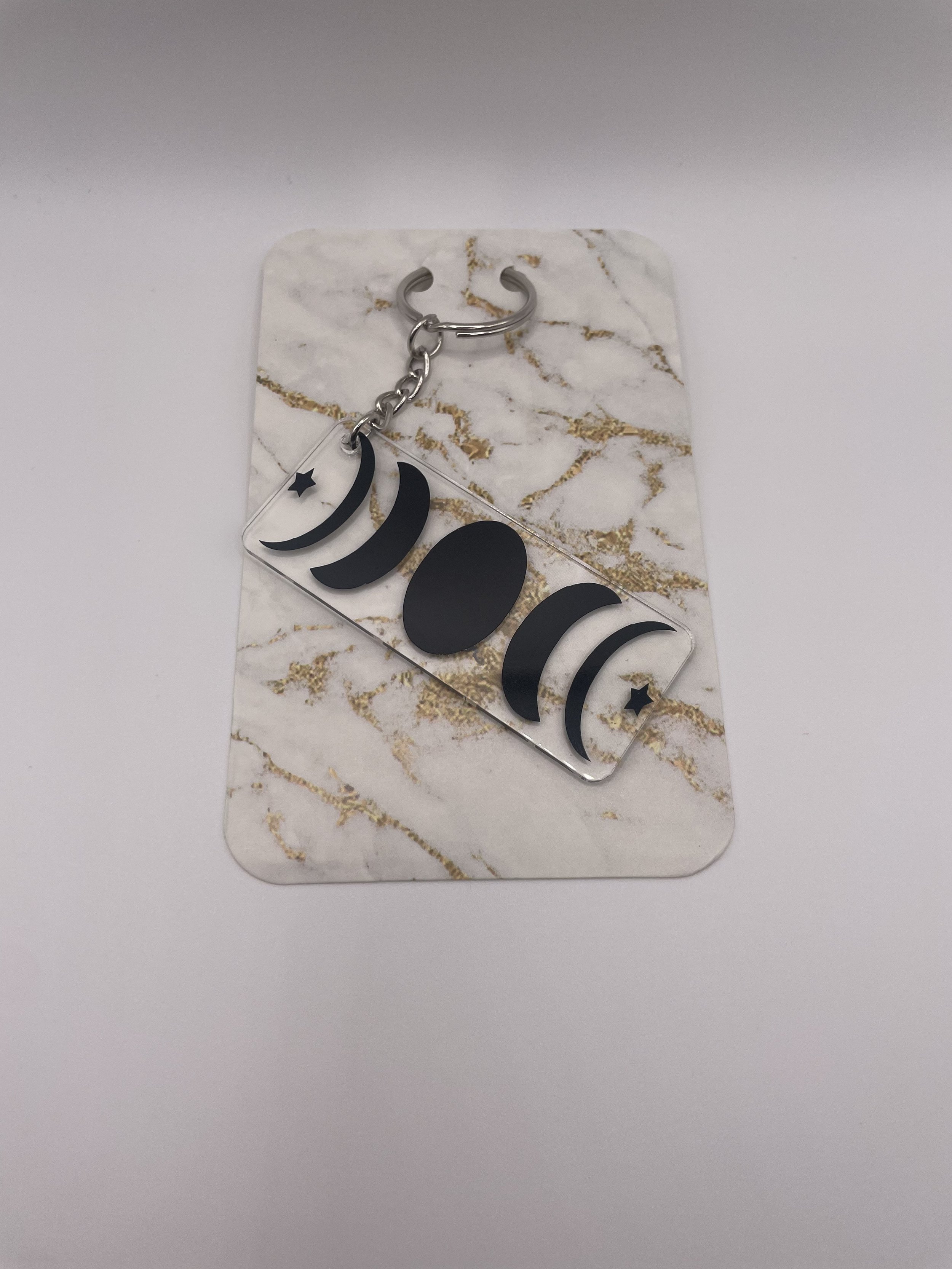 Black moon phase keychain rectangle.jpeg