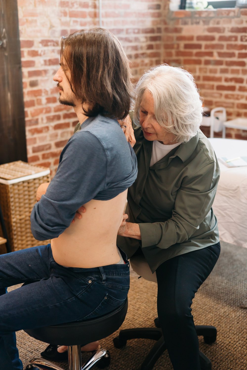 Therapist working with a male patient