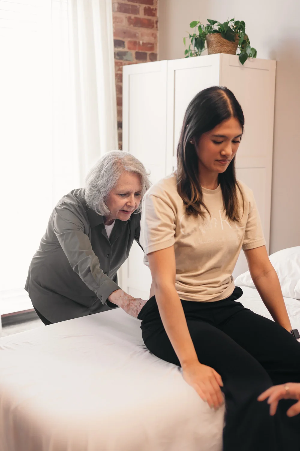 Pelvic floor physical therapist treating a patient
