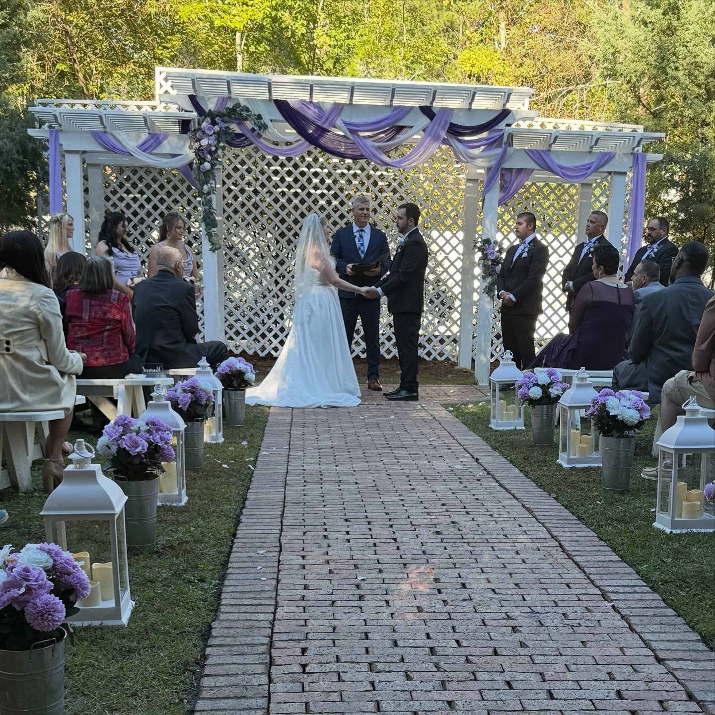 ✨ Monday weddings hit different ✨
Love was definitely in the air as this sweet couple said &ldquo;I do&rdquo; surrounded by friends, family, and the prettiest purple details. 💜

Our pergola looked stunning draped in soft lavender and white, a perfec