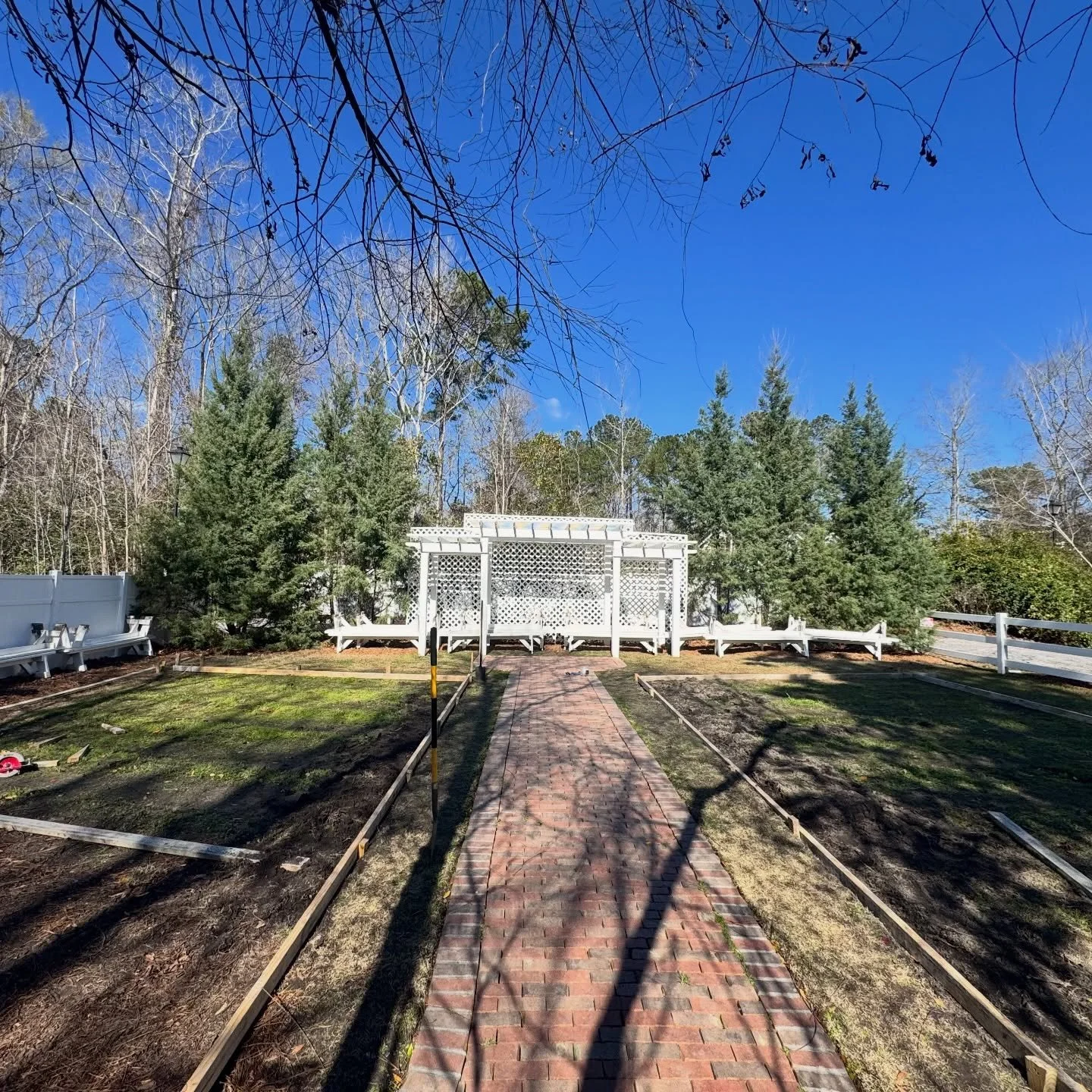 We officially broke ground on something that makes us so happy at 108 W Main.

We are adding stamped concrete pads on both sides of our ceremony aisle where our benches sit. It may seem like a small detail, but it completely elevates our ceremony gar