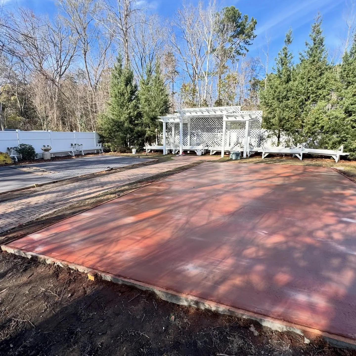 Update 2 and we are loving how this is coming together.

Our stamped concrete bench pads are taking shape in our ceremony garden at 108 W Main and the clean lines already make such a difference. It feels more structured, more polished, and still full