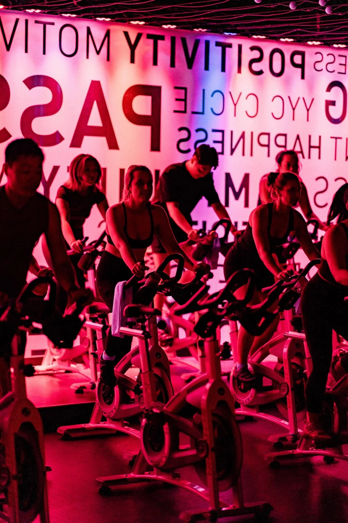 Bikergang focused while riding during a class
