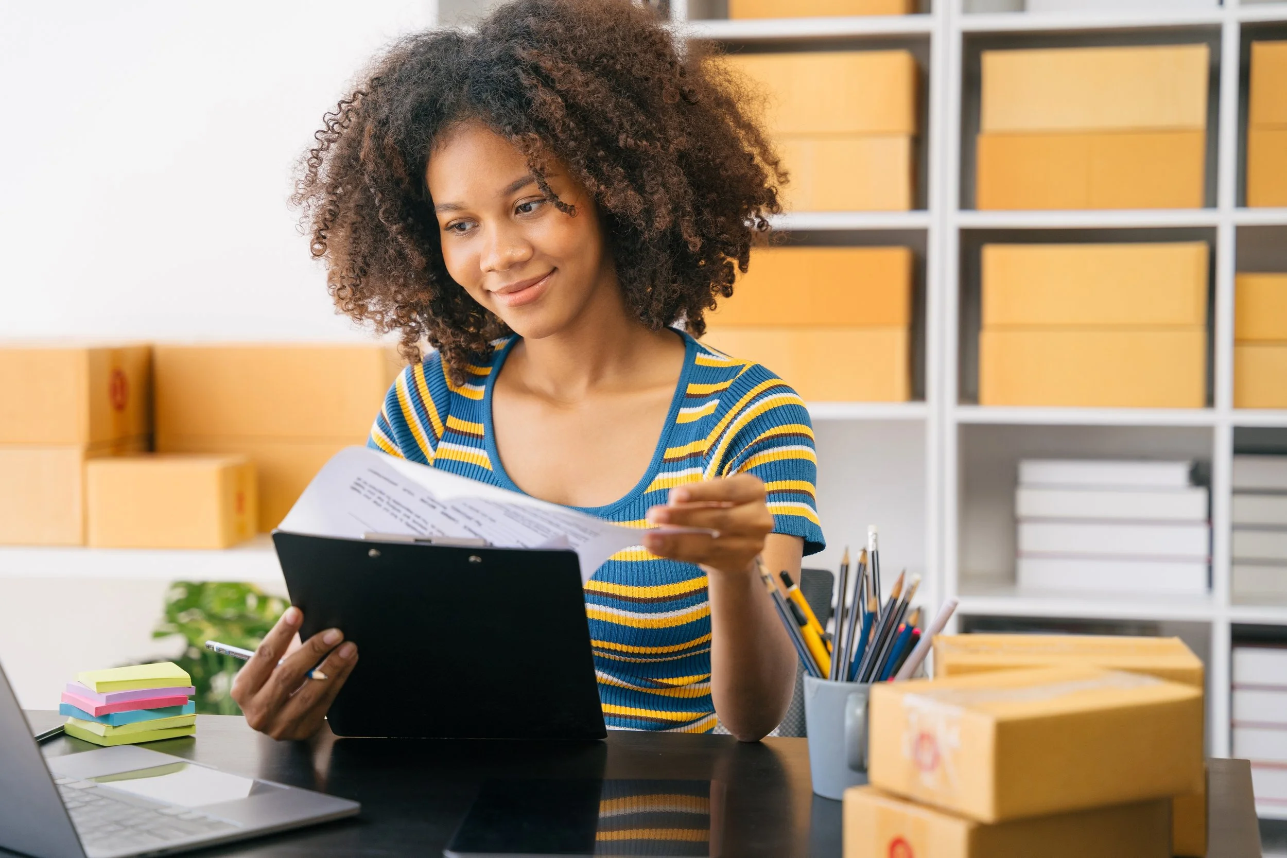 A food founder reviewing her expenses and product margin