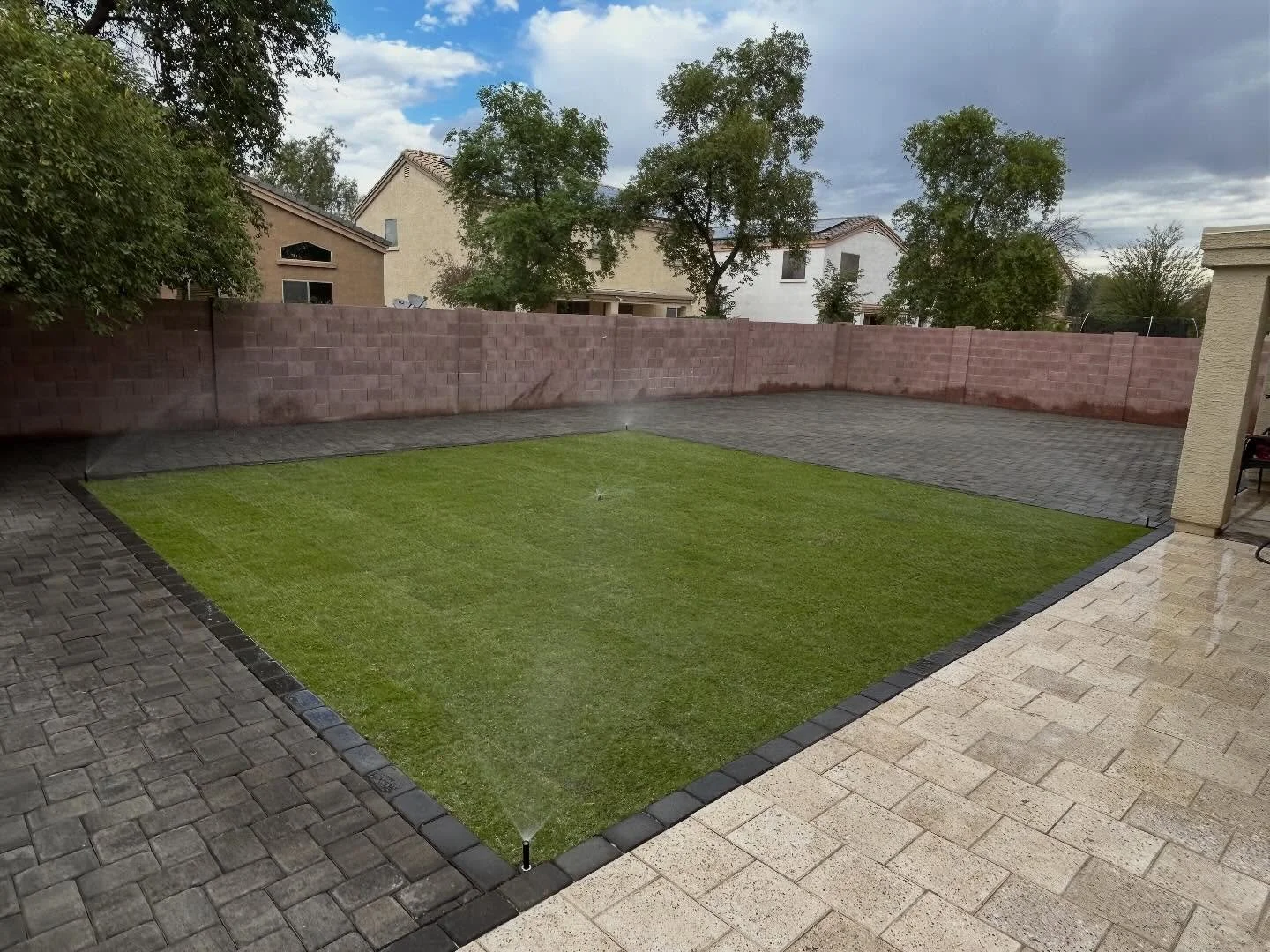🌿 Backyard Transformation Goals! 🌿
Another before &amp; after that says it all 😍 &mdash; from dirt and dust to a full backyard oasis!
✨ We installed two styles of pavers, a custom irrigation system, and lush real grass for the perfect mix of beaut