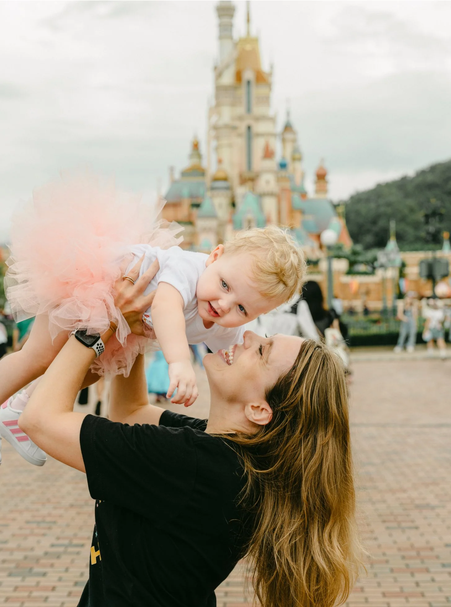 Mom and baby in Disneyland.jpg