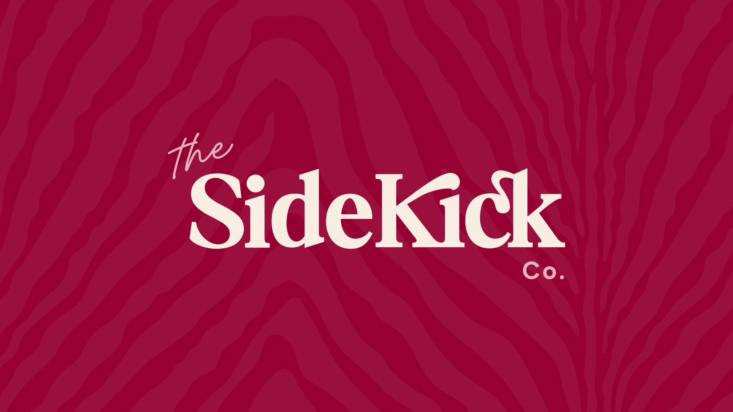 Logo with maroon background and wavy pattern, displaying the text 'the SideKick Co.' in contrasting white and light pink fonts.
