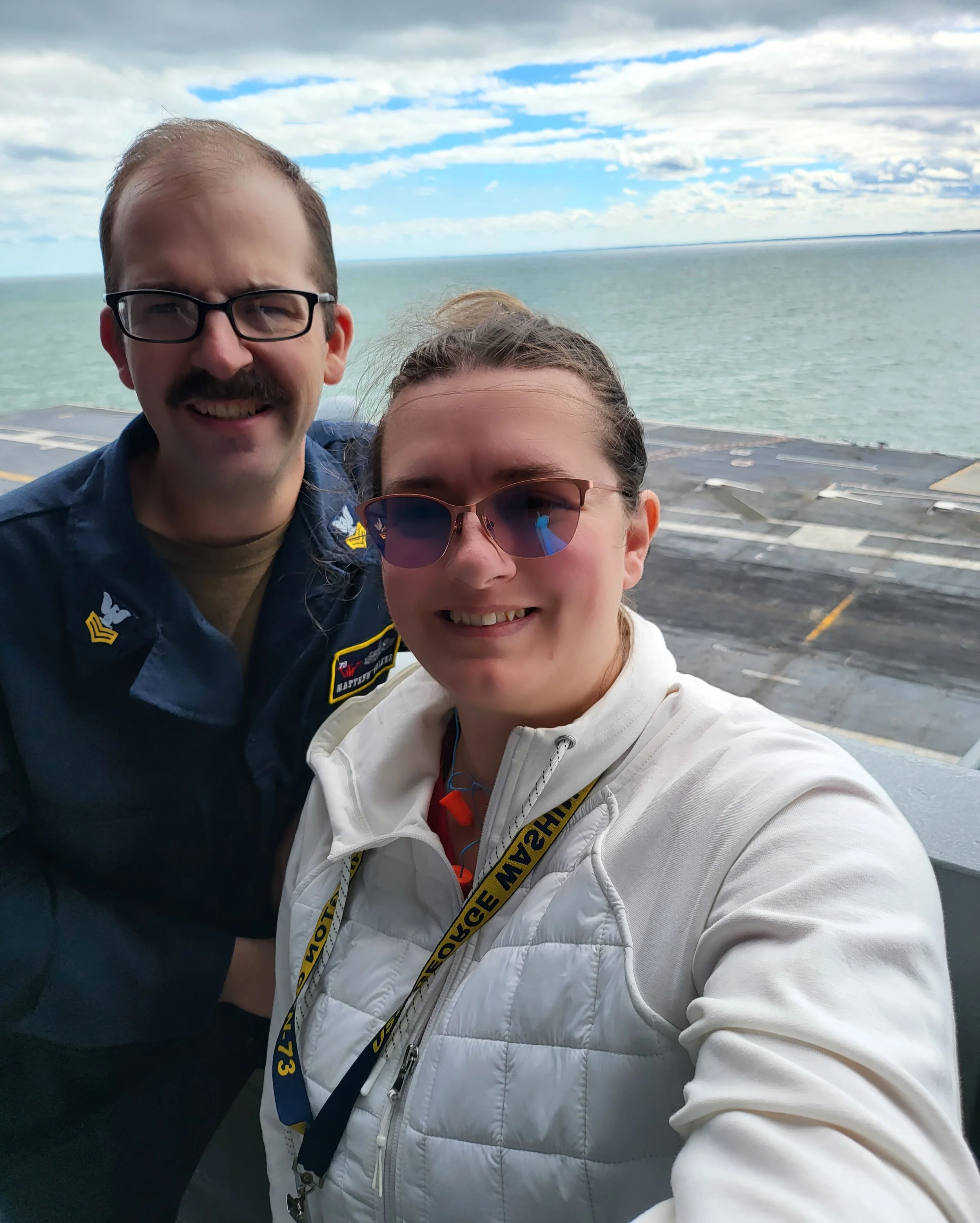Latosha and Matthew Walker together on a ship overlooking the water