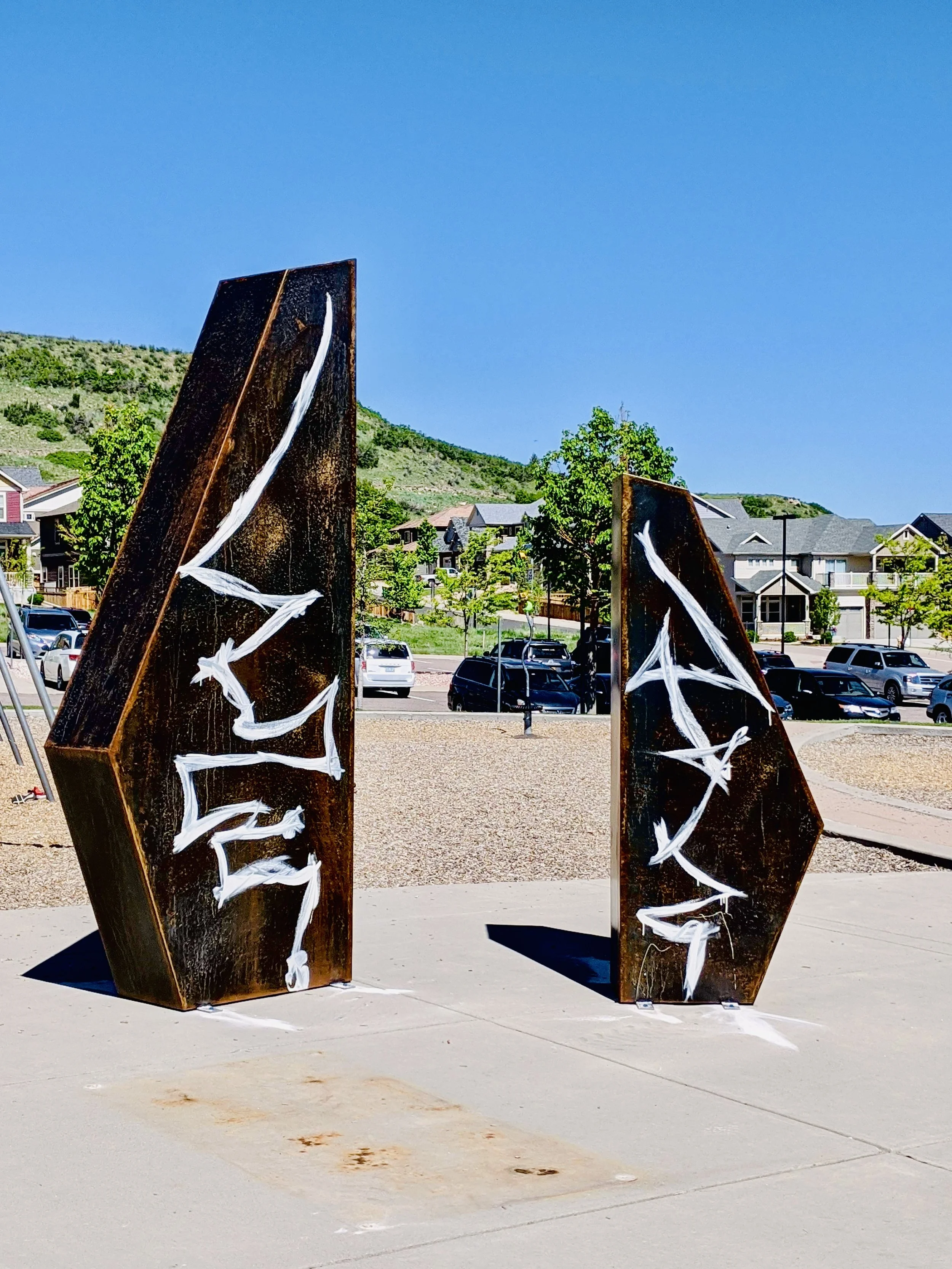 SPLICE - 10’ X 10’ X 10’ MILD STEEL WITH PATINA, PAINTED SURFACE