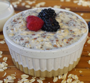 bowl of oatmeal topped with berries