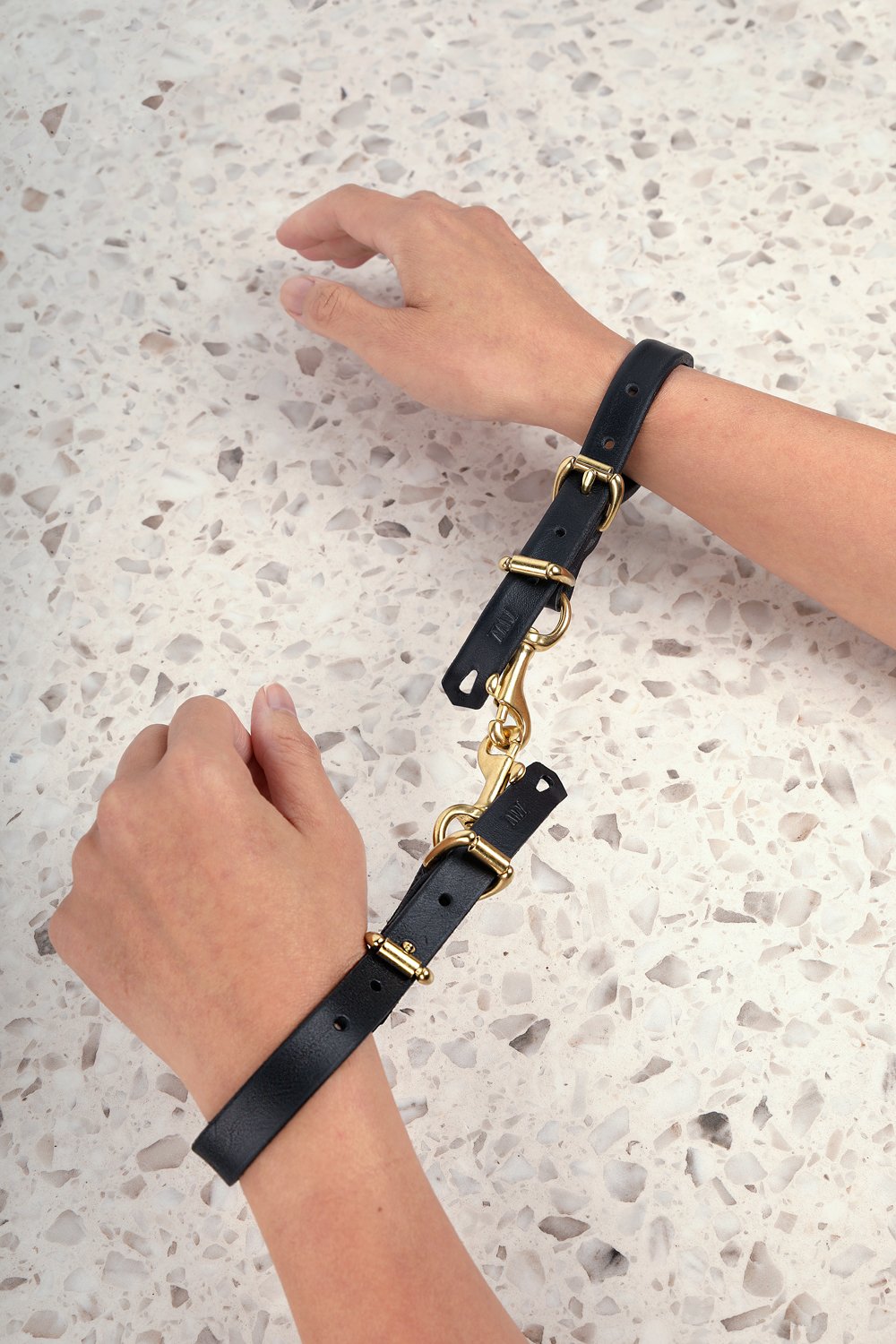 Kain-keyring-cuffs_black leather_model-shot_1J3A6036-v2.jpg
