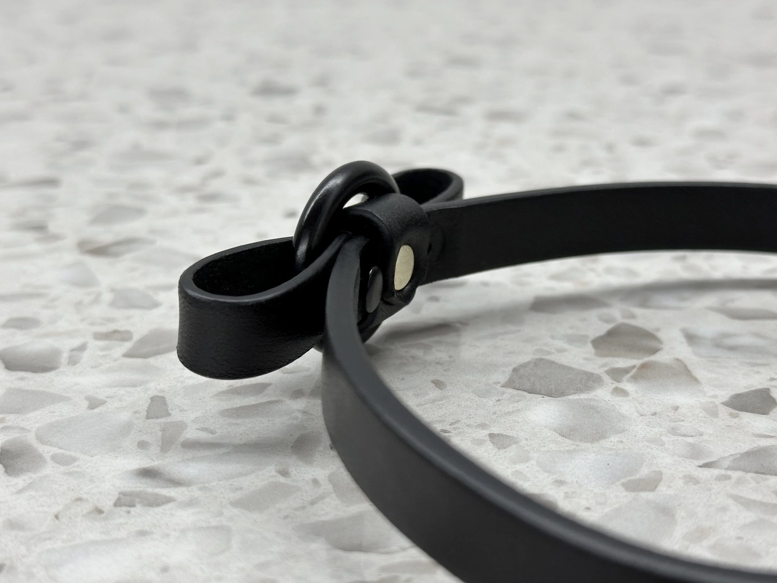 Atticus Ivy Baira black leather bow ring choker_back angle.jpg