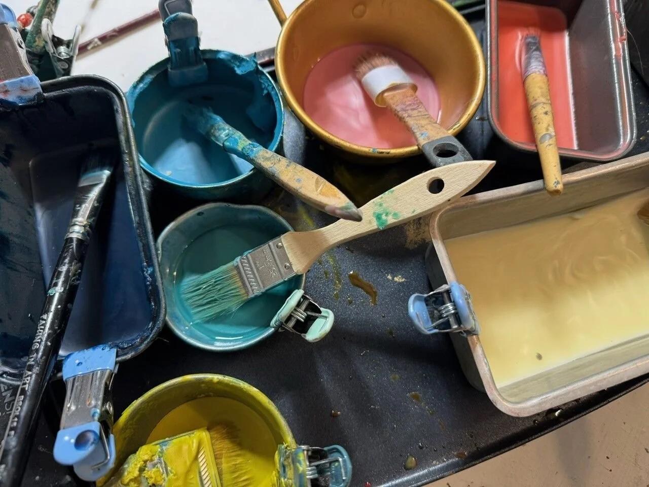 Behind every finished piece is a workspace that looks like this. 

Color everywhere, tools earning their keep, no shortage of creative chaos. 

Wouldn't have it any other way. 

#EmilyscottFineart #EncausticPainting #ArtistStudio #BehindTheArt #Artis