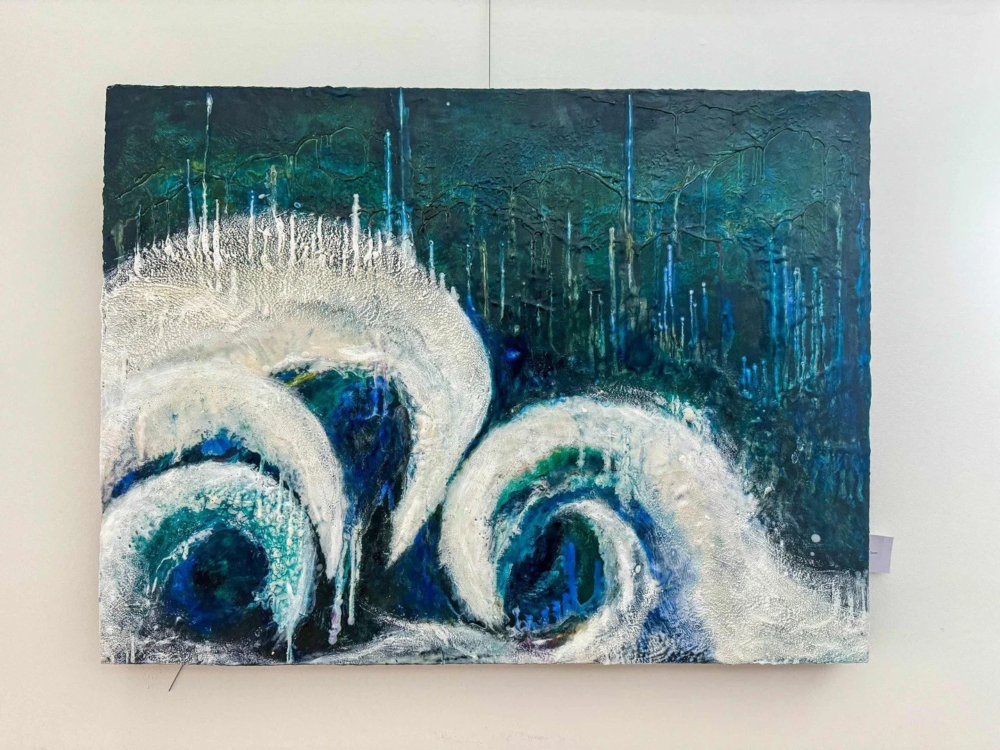 Waves of emotion, layers of encaustic, and the movement of the sea.

&ldquo;Waves of Grief&rdquo; explores the depth, texture, and power of ocean waves through rich blues, teal, and expressive layers of wax.

Medium: Encaustic
Size: 30 &times; 40 &ti