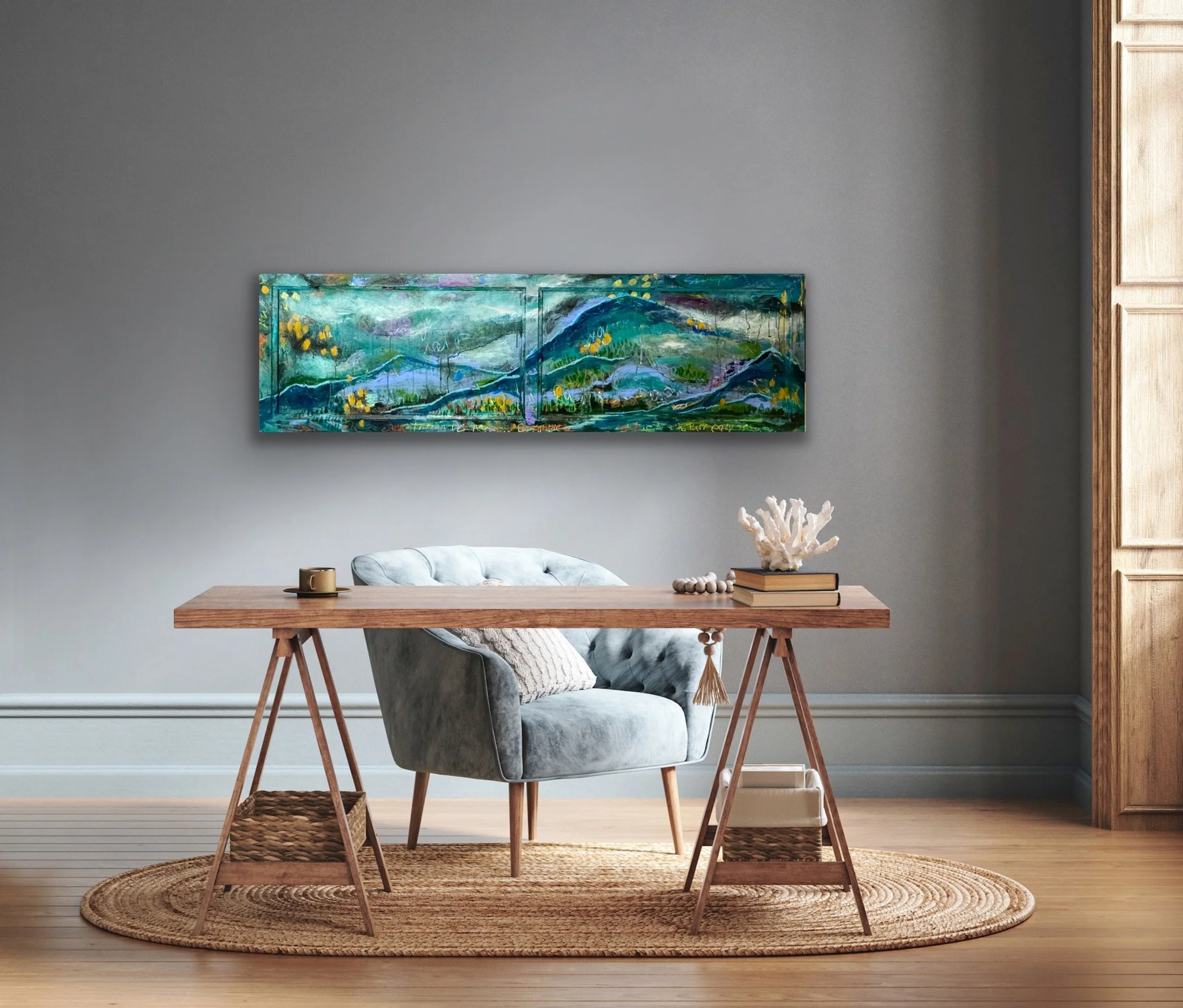 Horizontal teal and blue encaustic painting by Emily Scott, displayed above a desk in a home office leasing example
