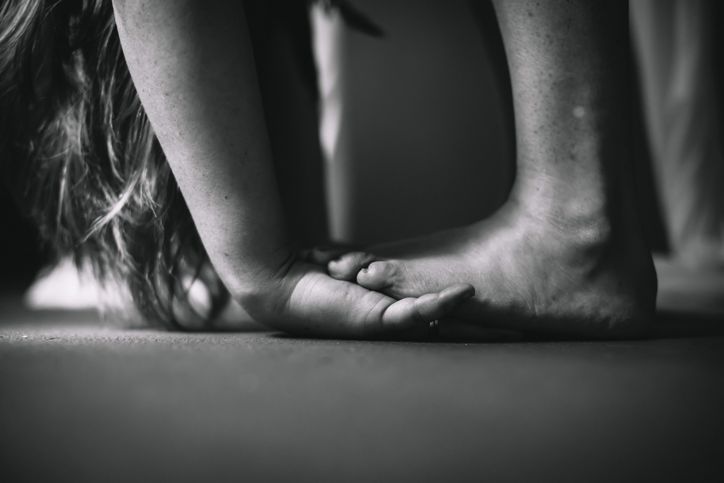 Emily Scott Fine Art photo feet and hands on floor Auburn Alabama