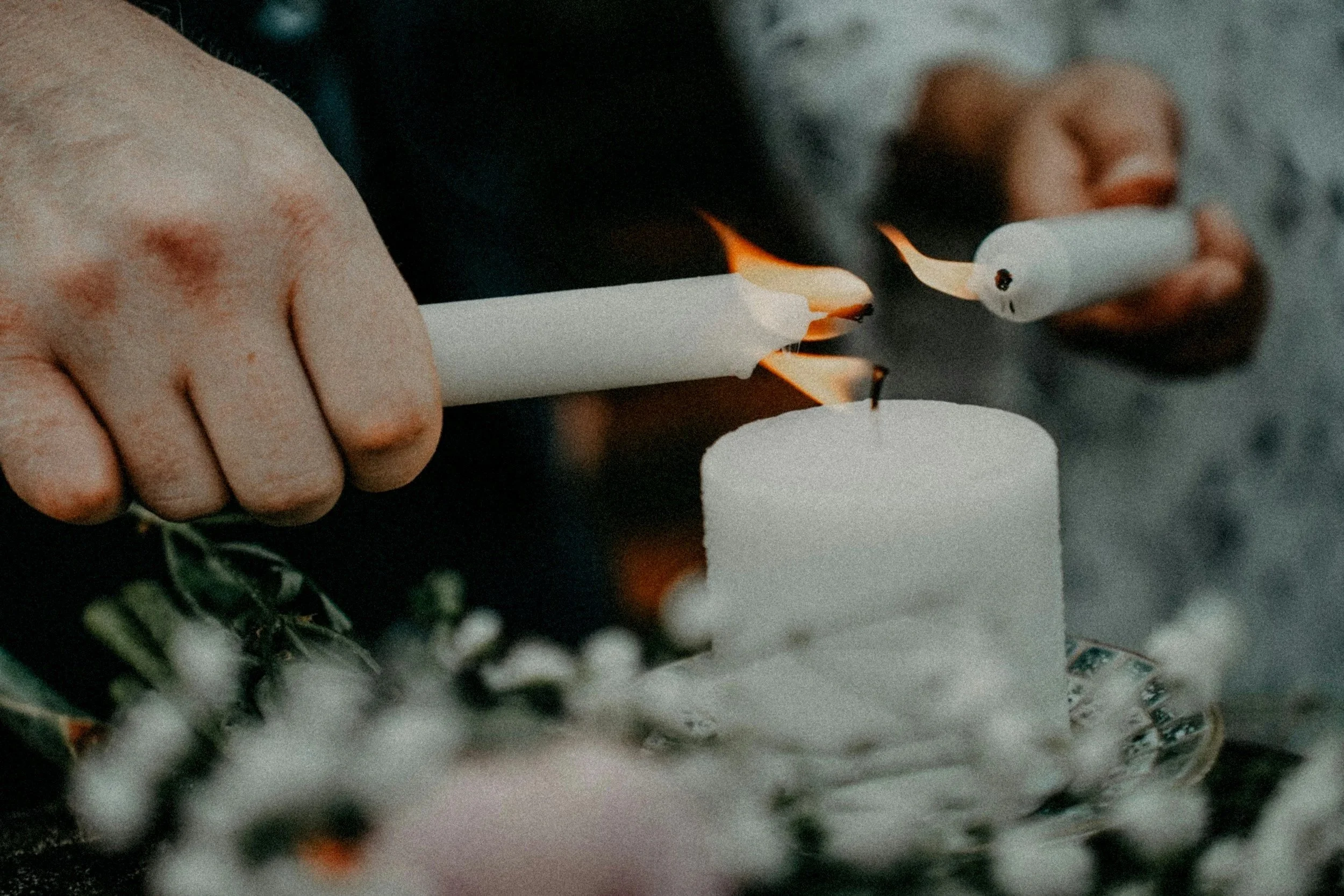 lighting a candle with community