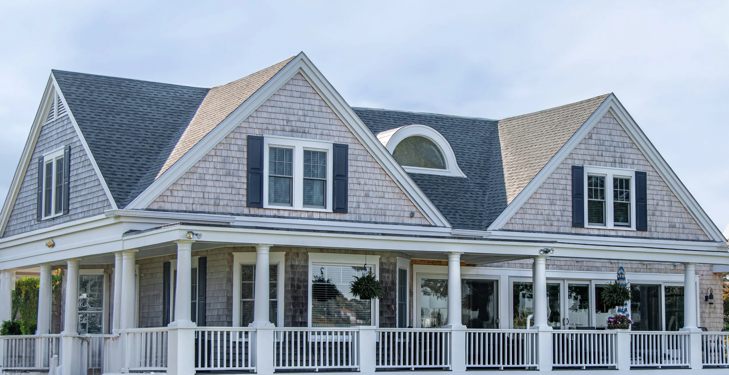 Home with grey architectural roofing shingles
