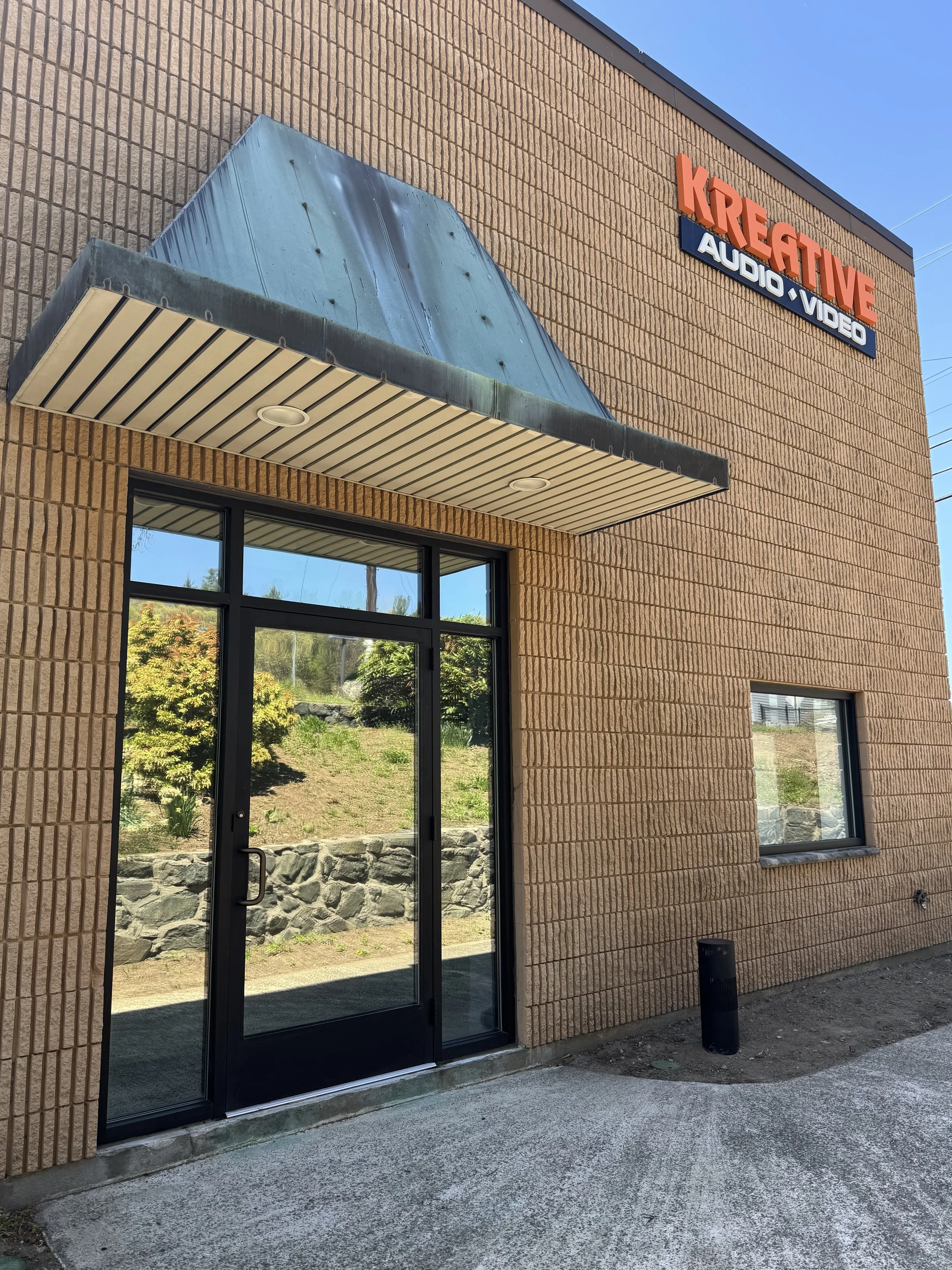 Office building with reflective window film for privacy and a modern aesthetic.