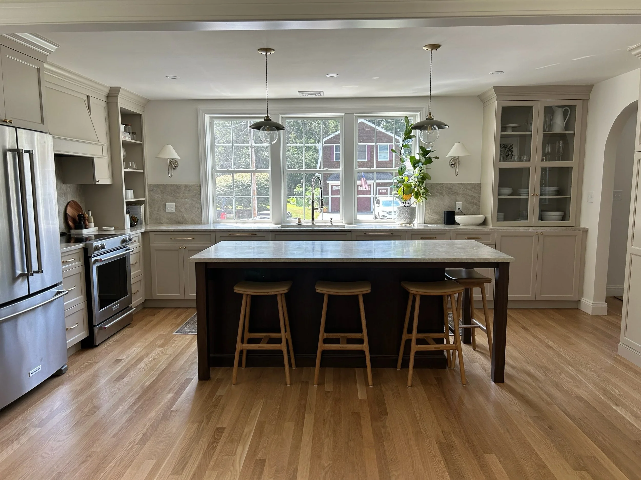 Protecting kitchen furniture and flooring from sun damage with solar control film.