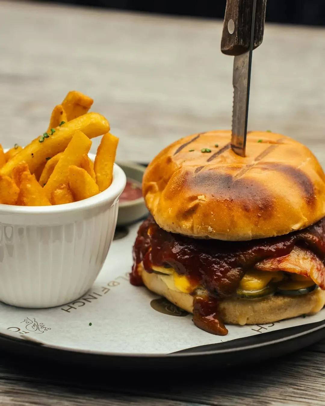When lunch calls for something satisfying. Part of our lunch specials, the Smashed Beef Burger features two smashed patties, smoked bacon, double cheese, and bird&rsquo;s eye sauce. 🍔✨

Available Tuesday to Friday, 11:30am&ndash;2pm. Book through li