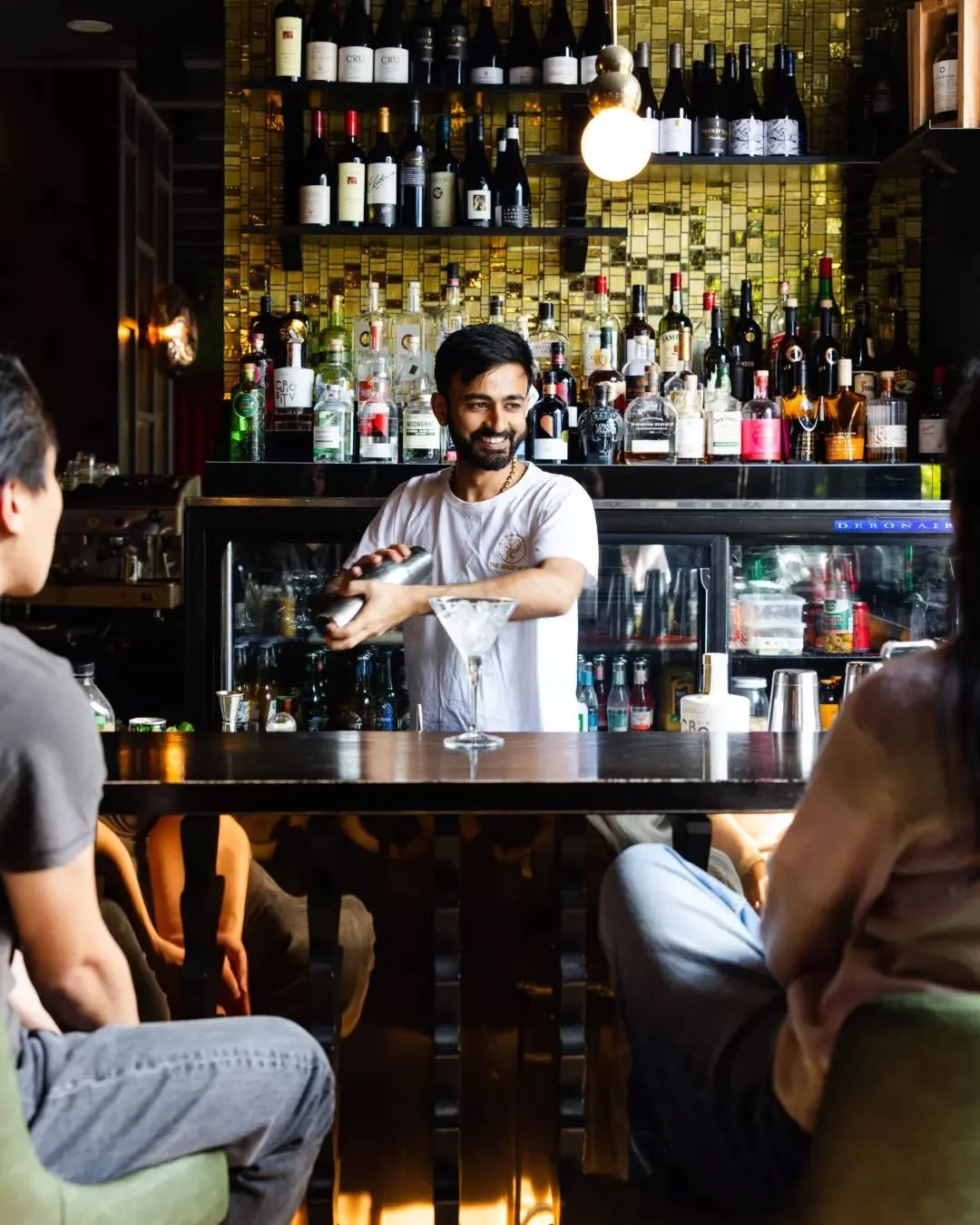 The alchemy of the evening. 🍸✨ Pull up a chair, find your light, and let our team craft something truly exceptional for you this long weekend.