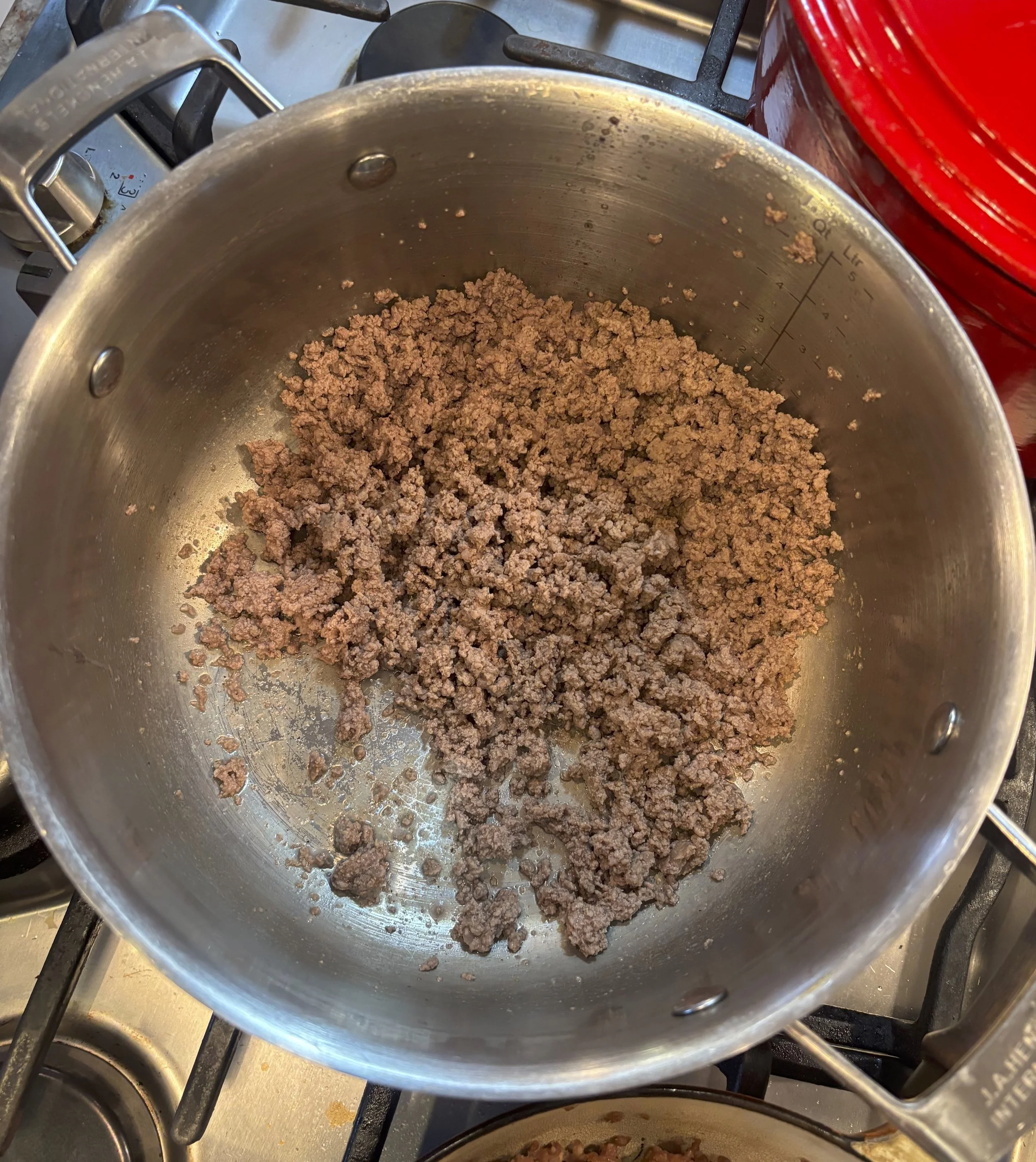 Brown ground beef.  Drain