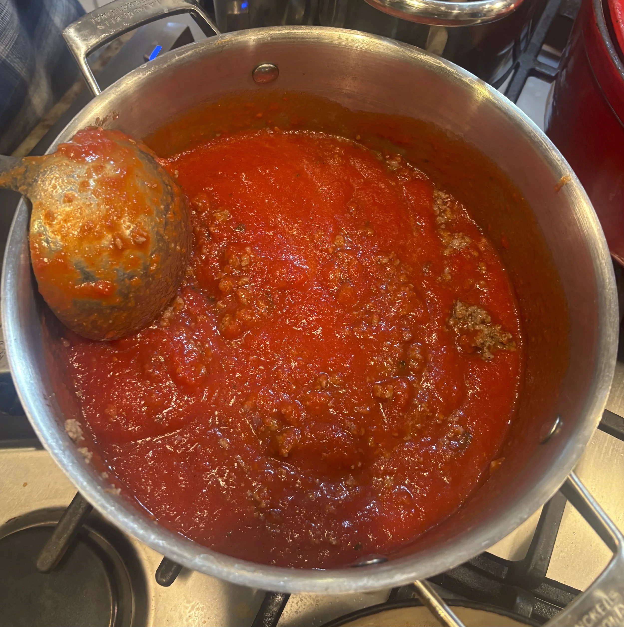 Add sauce to brown beef.  See sauce recipe