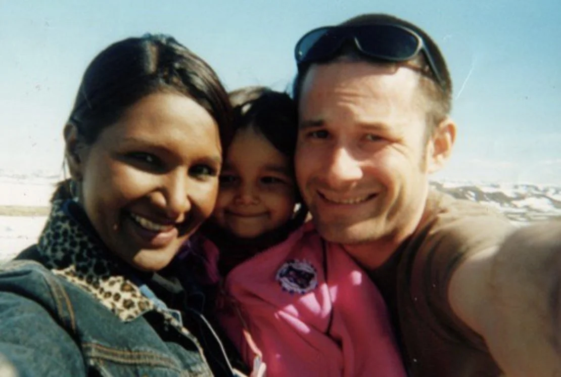 Anastacia with her parents as a young girl. Image courtesy of Anastacia Mala.