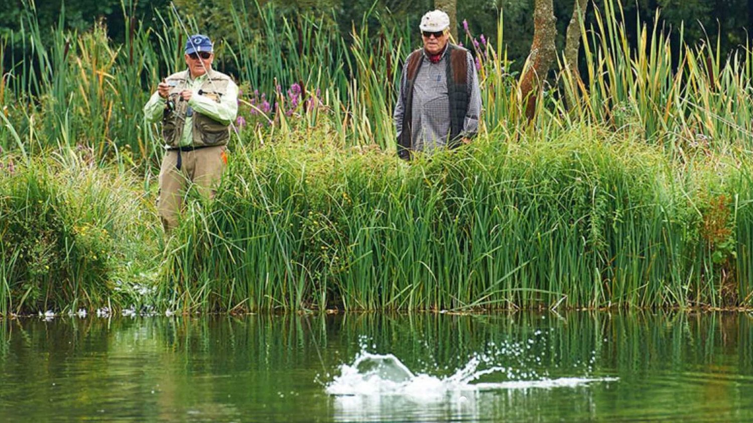 Two anglers fly fishing together at Tanfield Lodge Lake