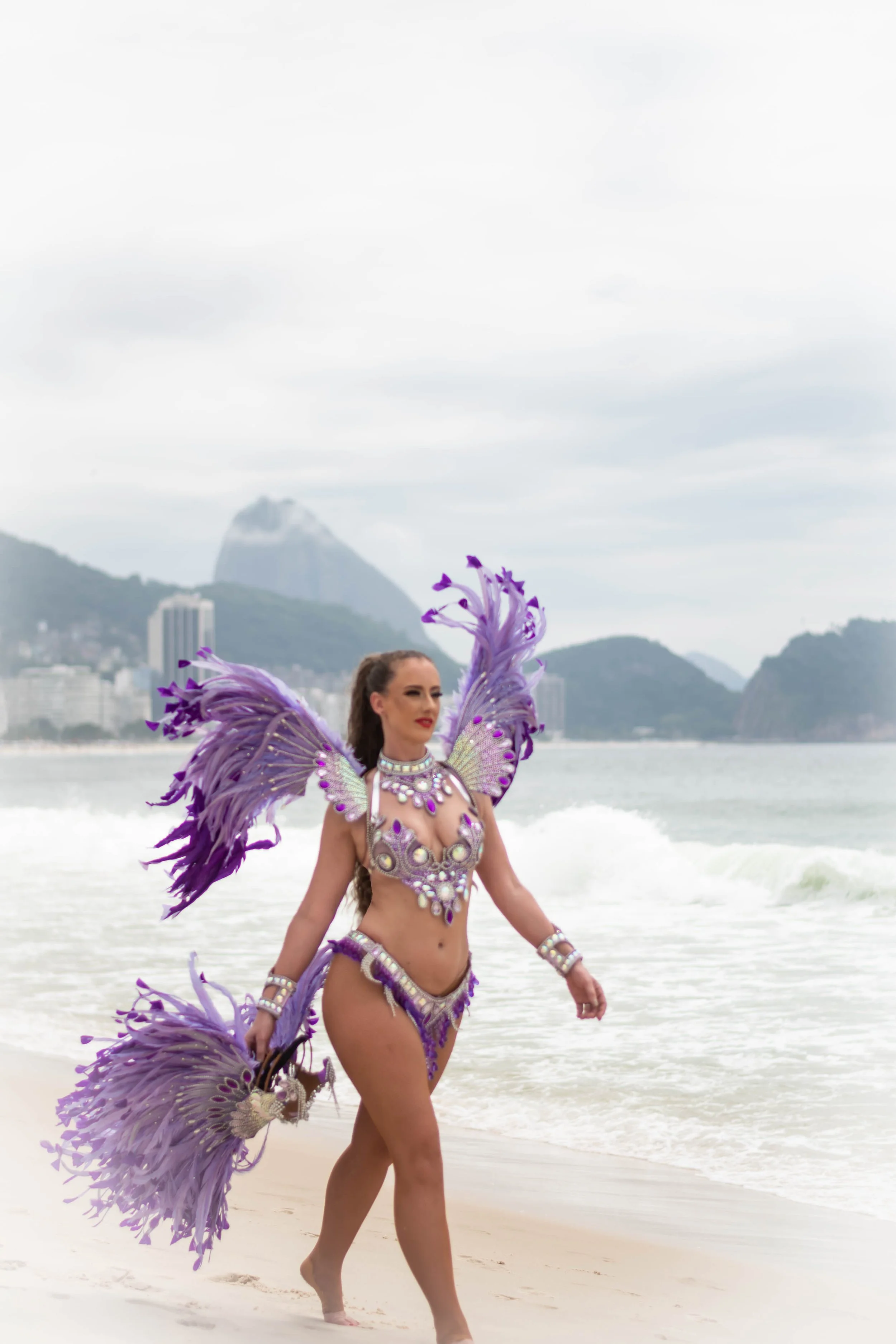 Samba dancer Cat Hill on Copacabana Beach in lilac fantasia