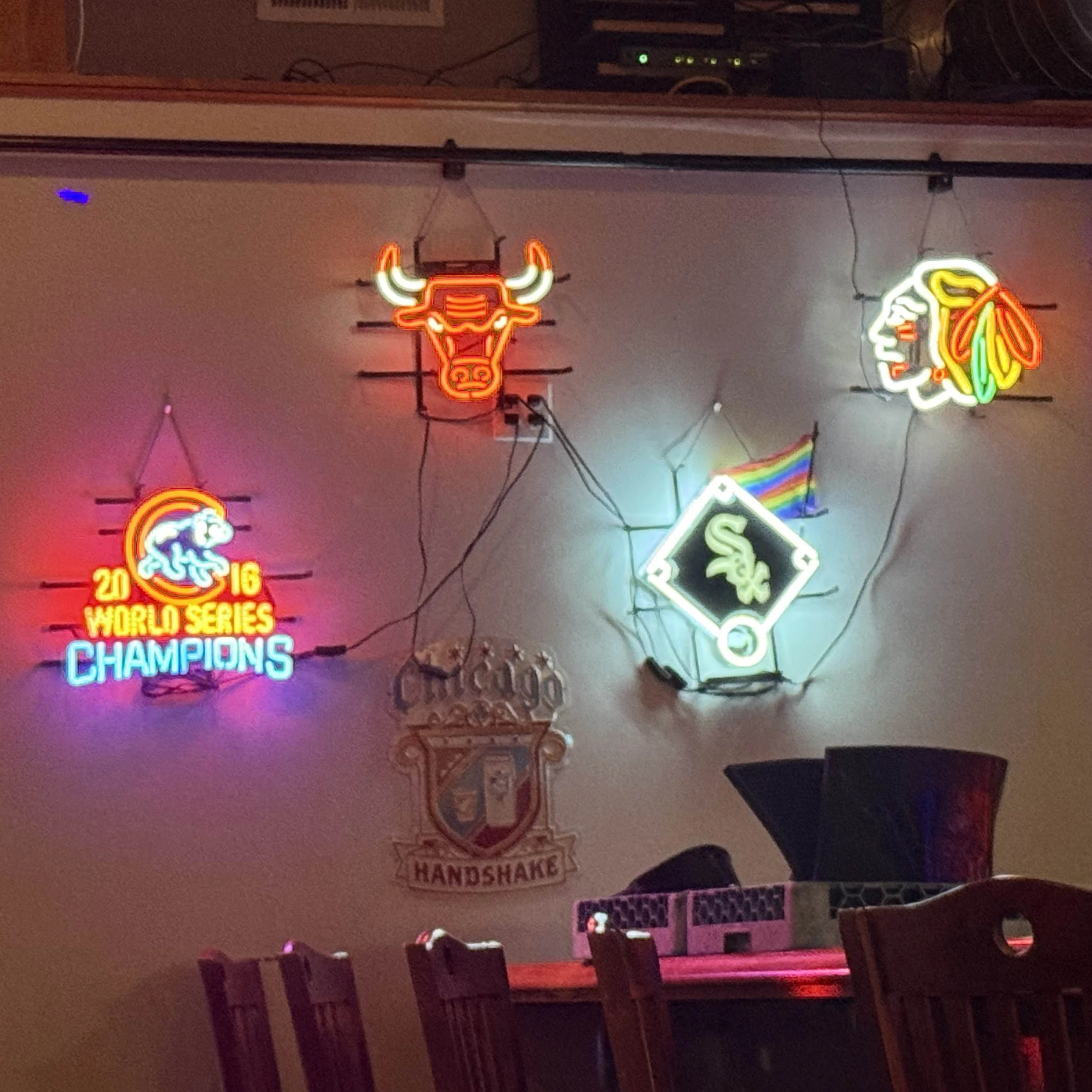 Chicago sports neon signs inside Chicago Beef Joint in Grand Rapids, Michigan, featuring the Bulls, Blackhawks, White Sox and Chicago Cubs during the GRkaraoke.com Karaoke Marathon 2026