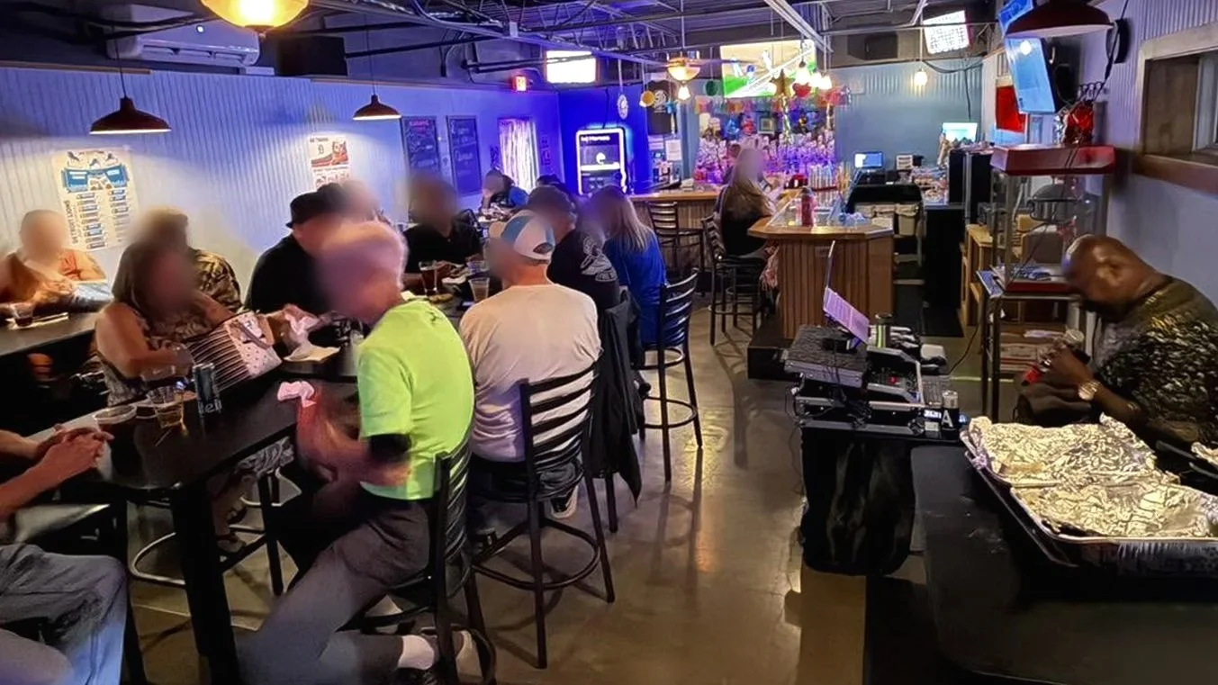 Inside 5th Degree Bar in Wyoming, Michigan, showing the intimate bar layout, high-top seating and karaoke setup at this Grand Rapids area karaoke venue