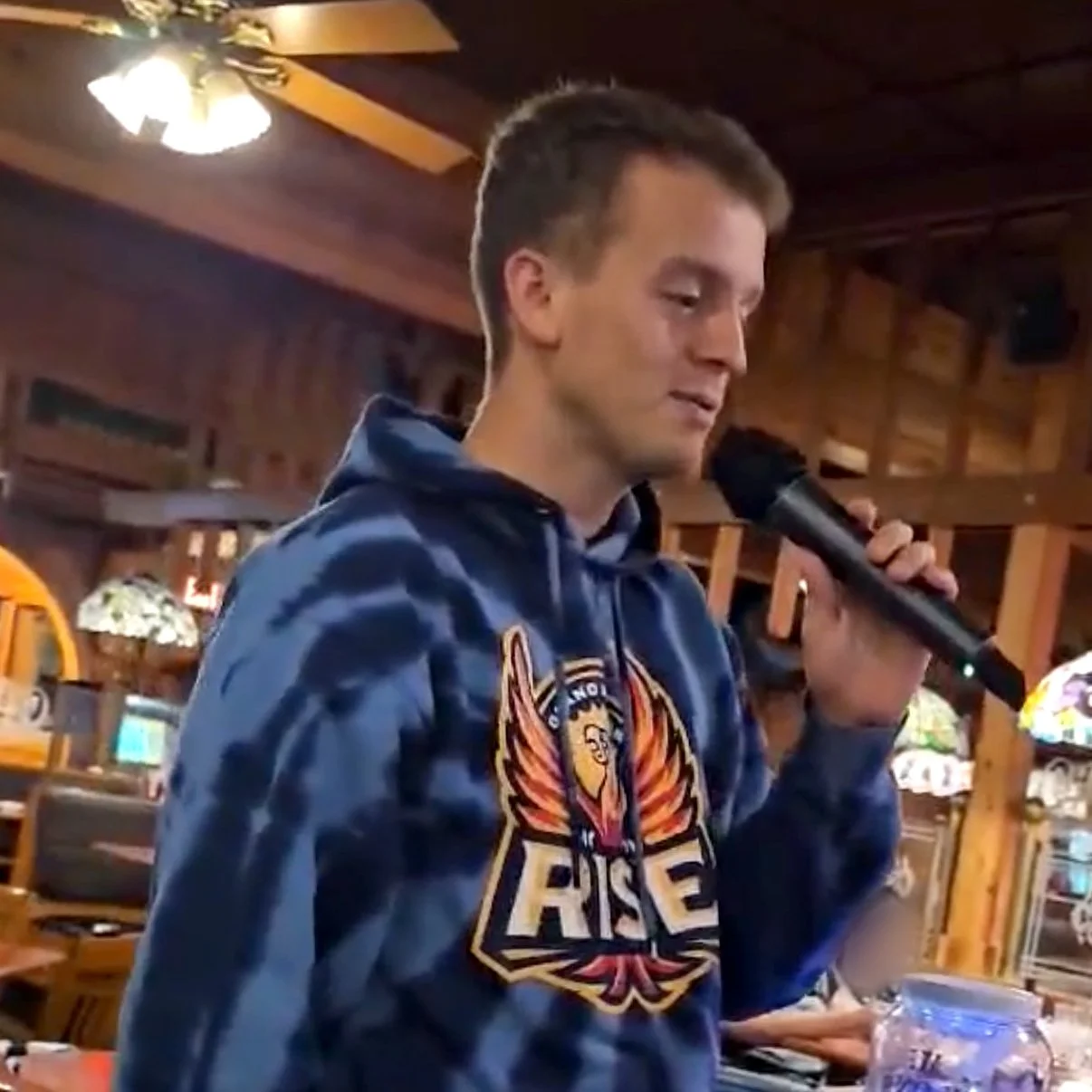 GRkaraoke.com founder Chris singing karaoke at Cheer’s Good Time Saloon on Plainfield Avenue in Grand Rapids, Michigan, during the Karaoke Marathon 2026