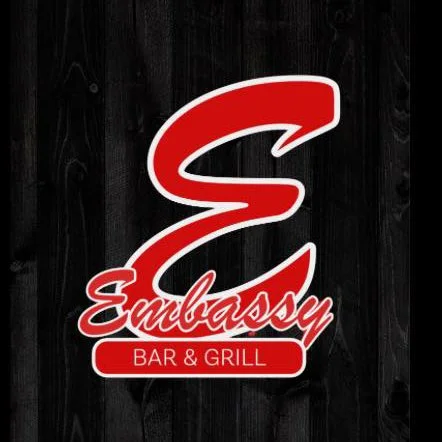 Embassy Bar & Grill logo, a West Olive, Michigan bar, restaurant and karaoke venue featured in the GRkaraoke.com Karaoke Marathon 2026