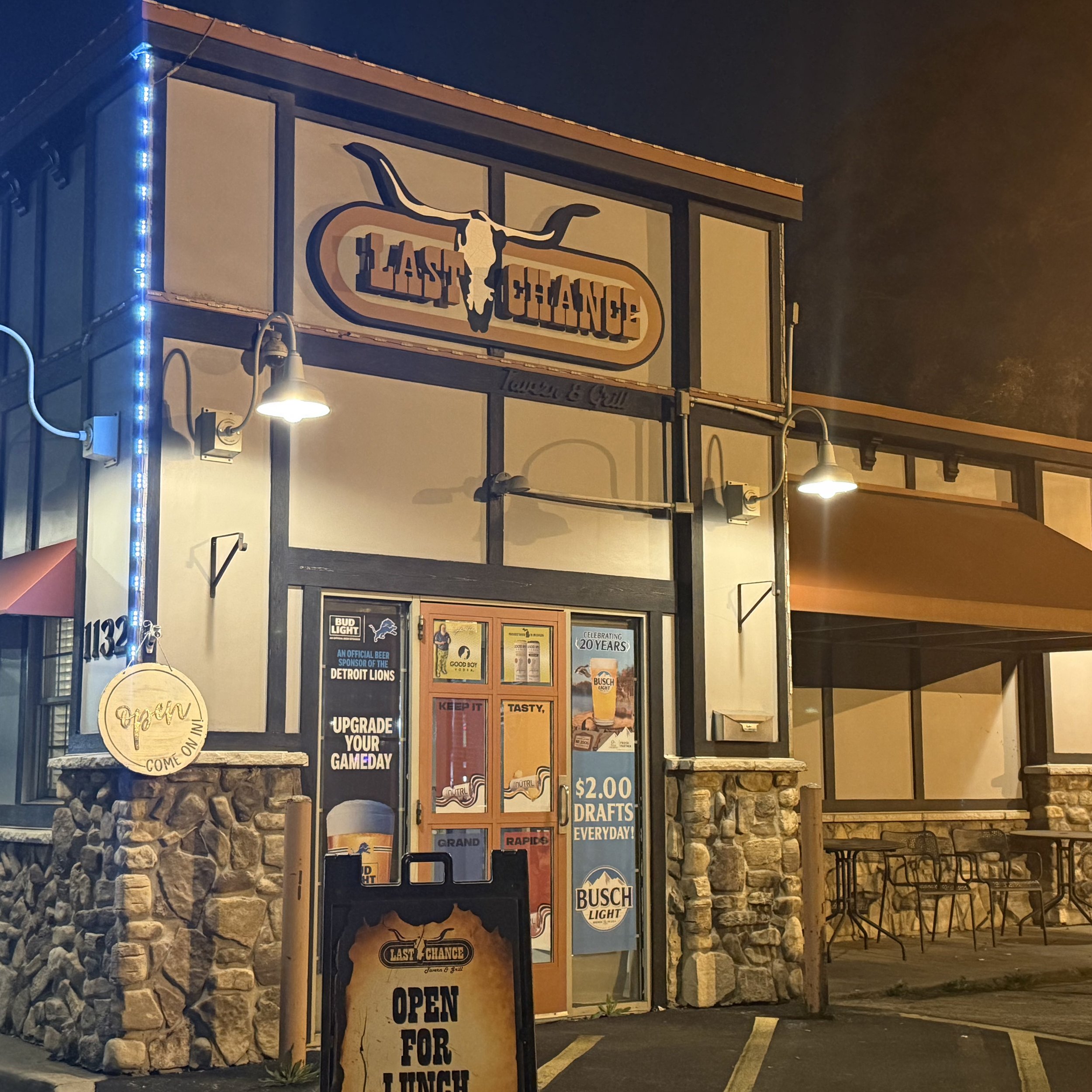 Exterior of Last Chance Tavern & Grill in Grand Rapids, Michigan, showing the entrance and illuminated building at night during the GRkaraoke.com Karaoke Marathon 2026
