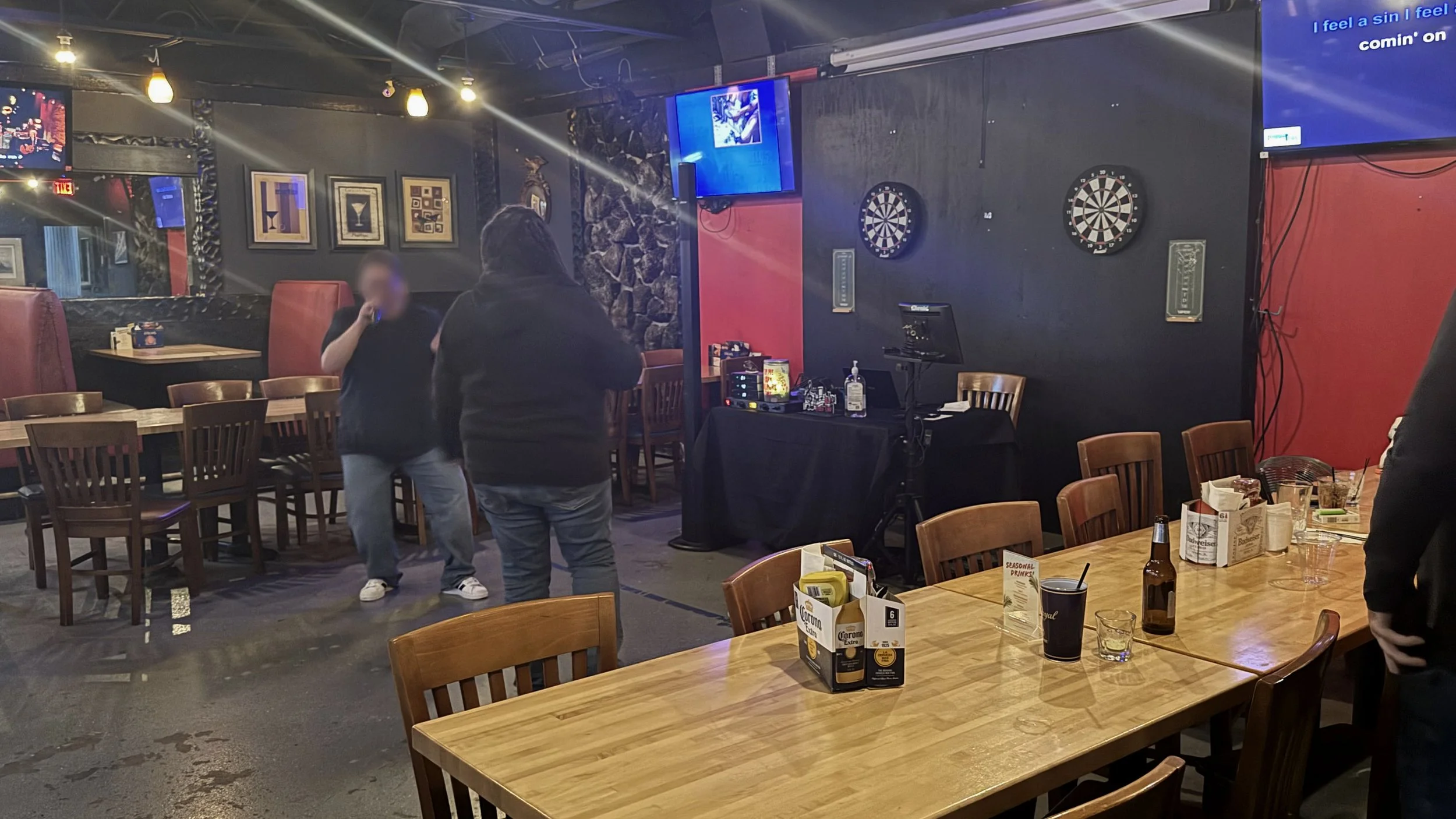 Karaoke night at Cesar’s Pub in Standale, Grand Rapids, Michigan, showing a singer performing among the tables and bar seating during the GRkaraoke.com Karaoke Marathon 2026