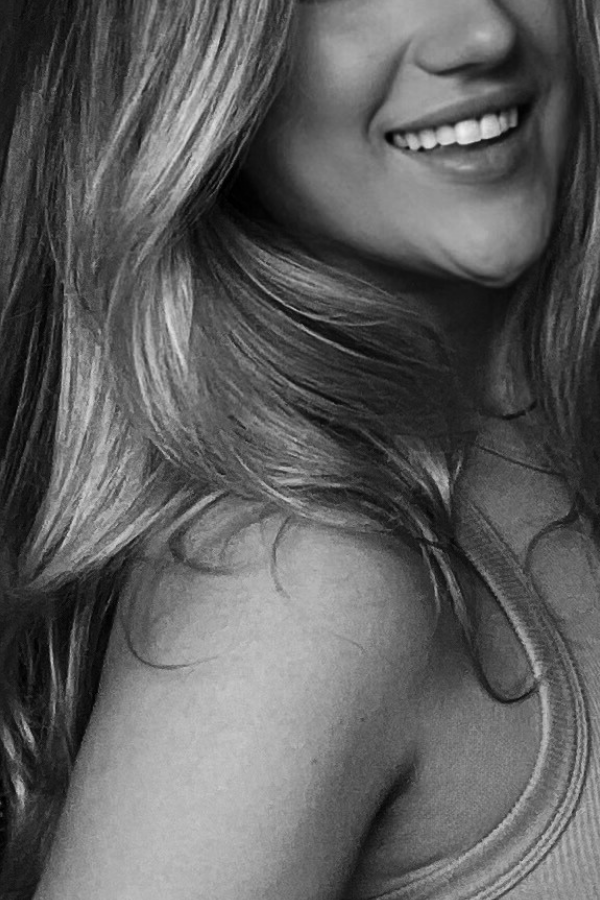Black and white photo of Michelle smiling