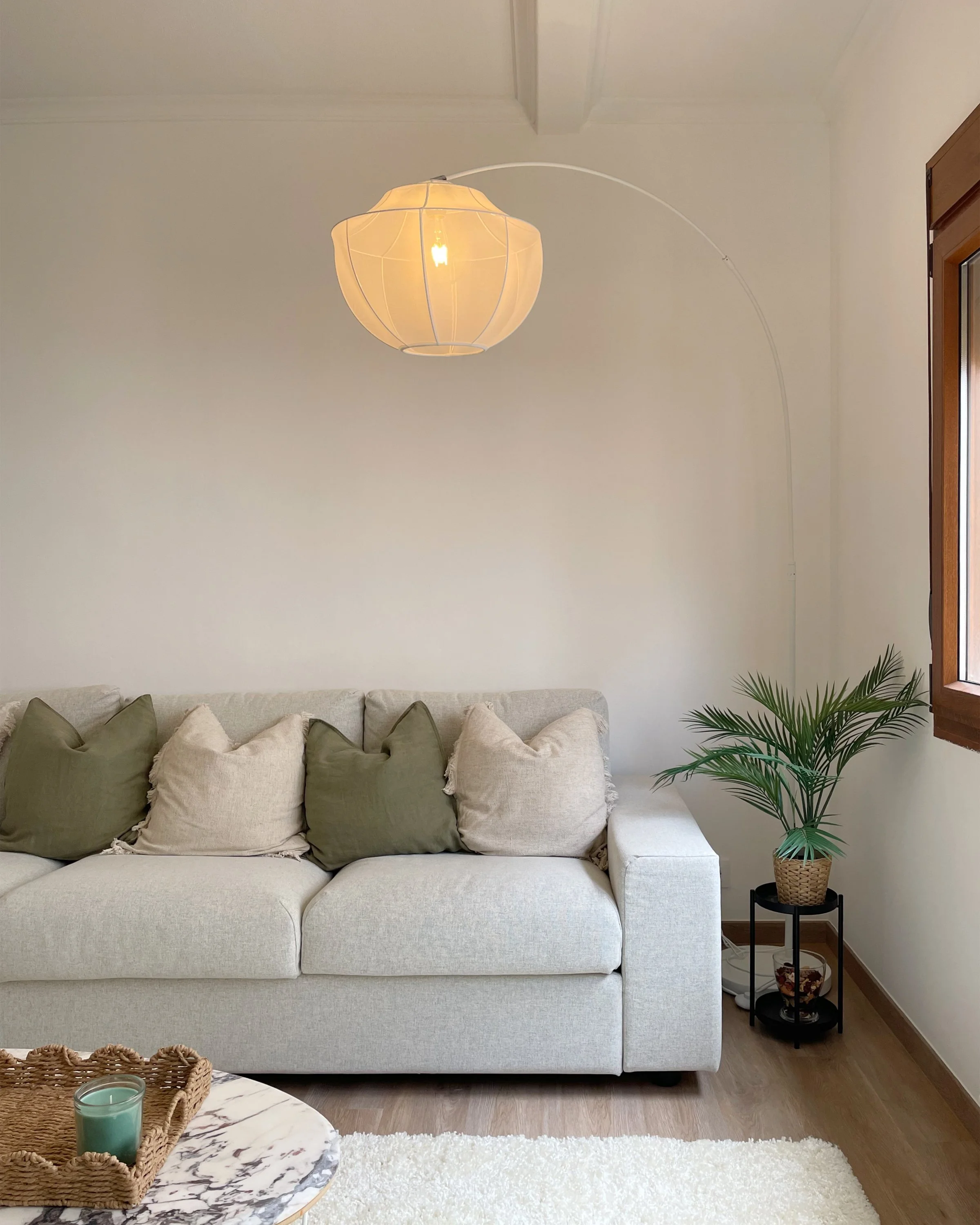 grey sofa timber floor white rug