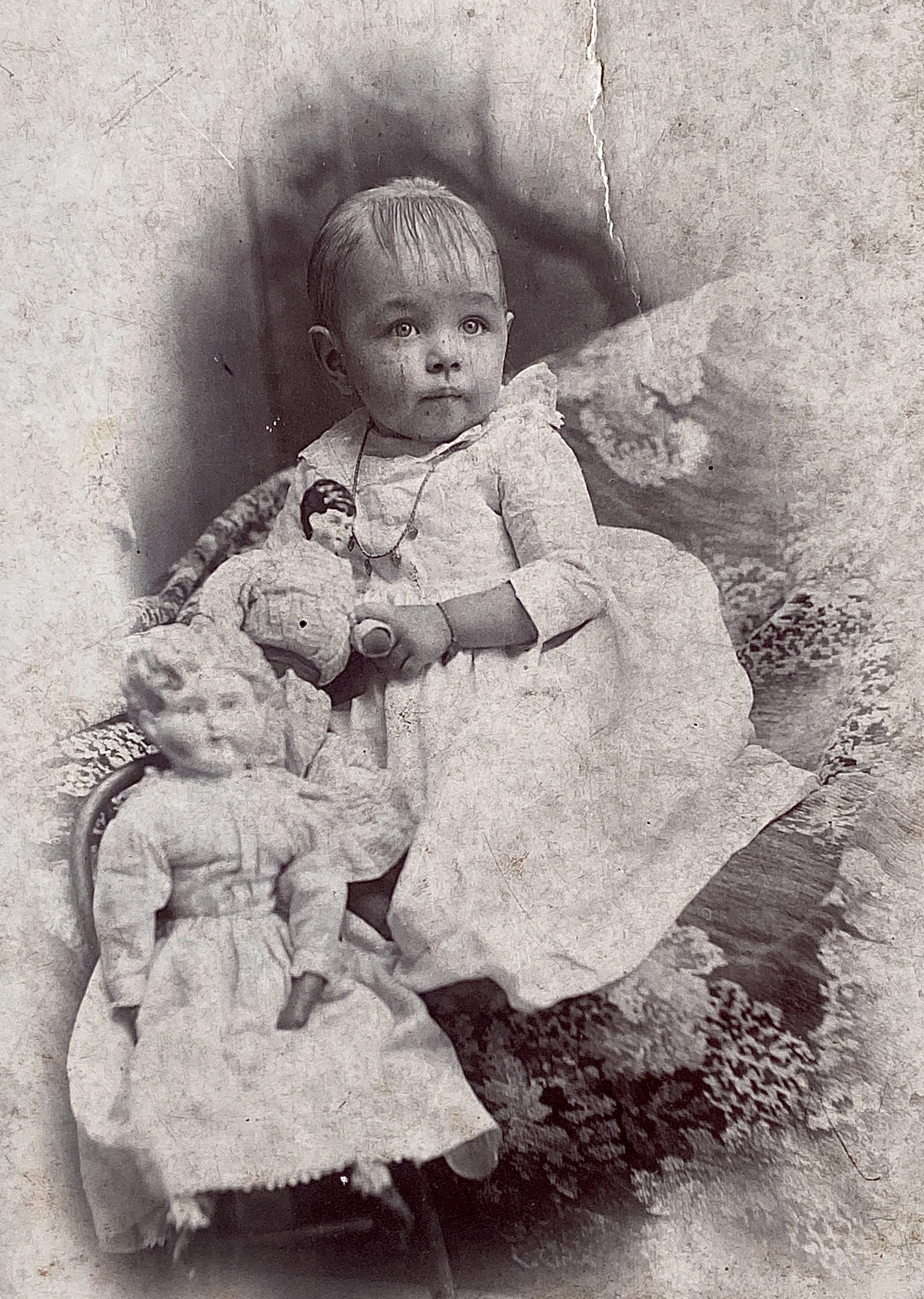 1893 Grandma Margaret Girvin Kirley with her two dolls, Alice and Maggie.