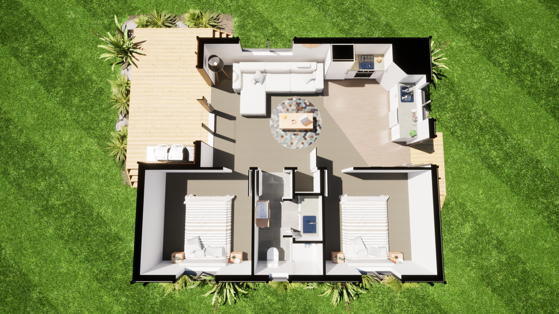 A top-down view of a house floor plan with two bedrooms, a bathroom, a living room, and a kitchen, surrounded by green grass and a wooden deck outside.